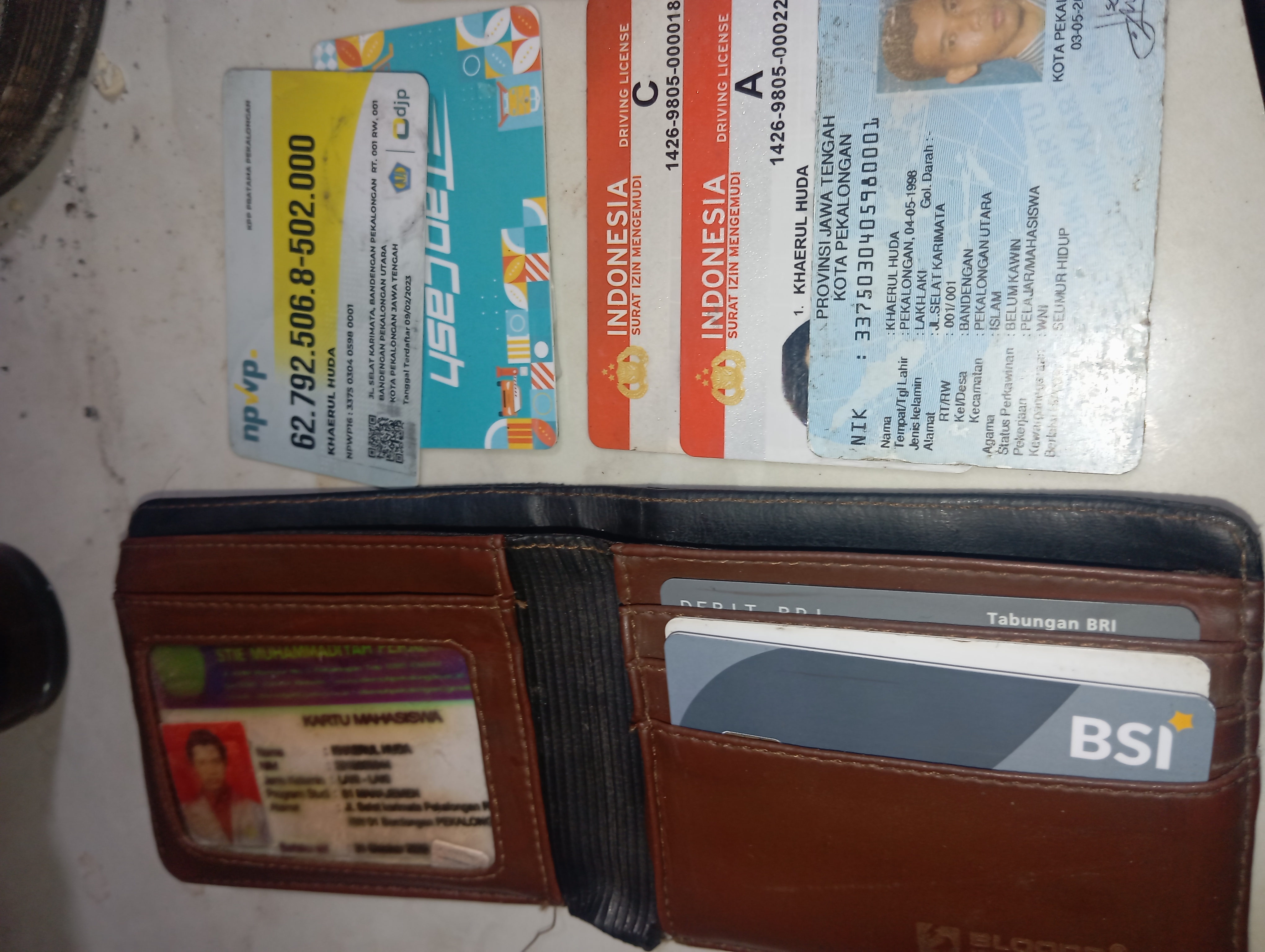 Foto laporan dompet (TB0815)