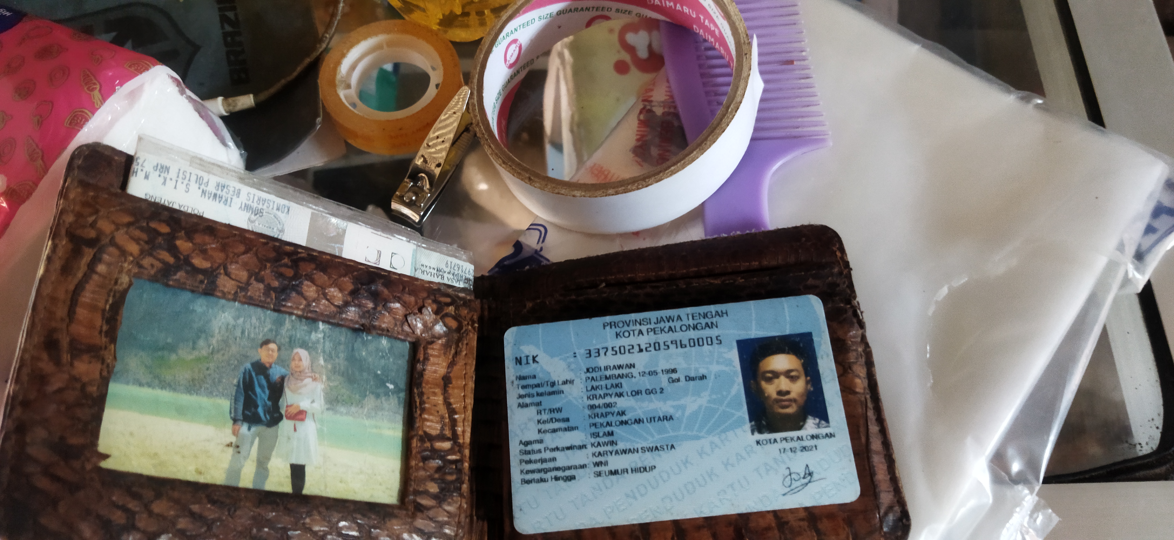 Foto laporan Dompet (TB0819)