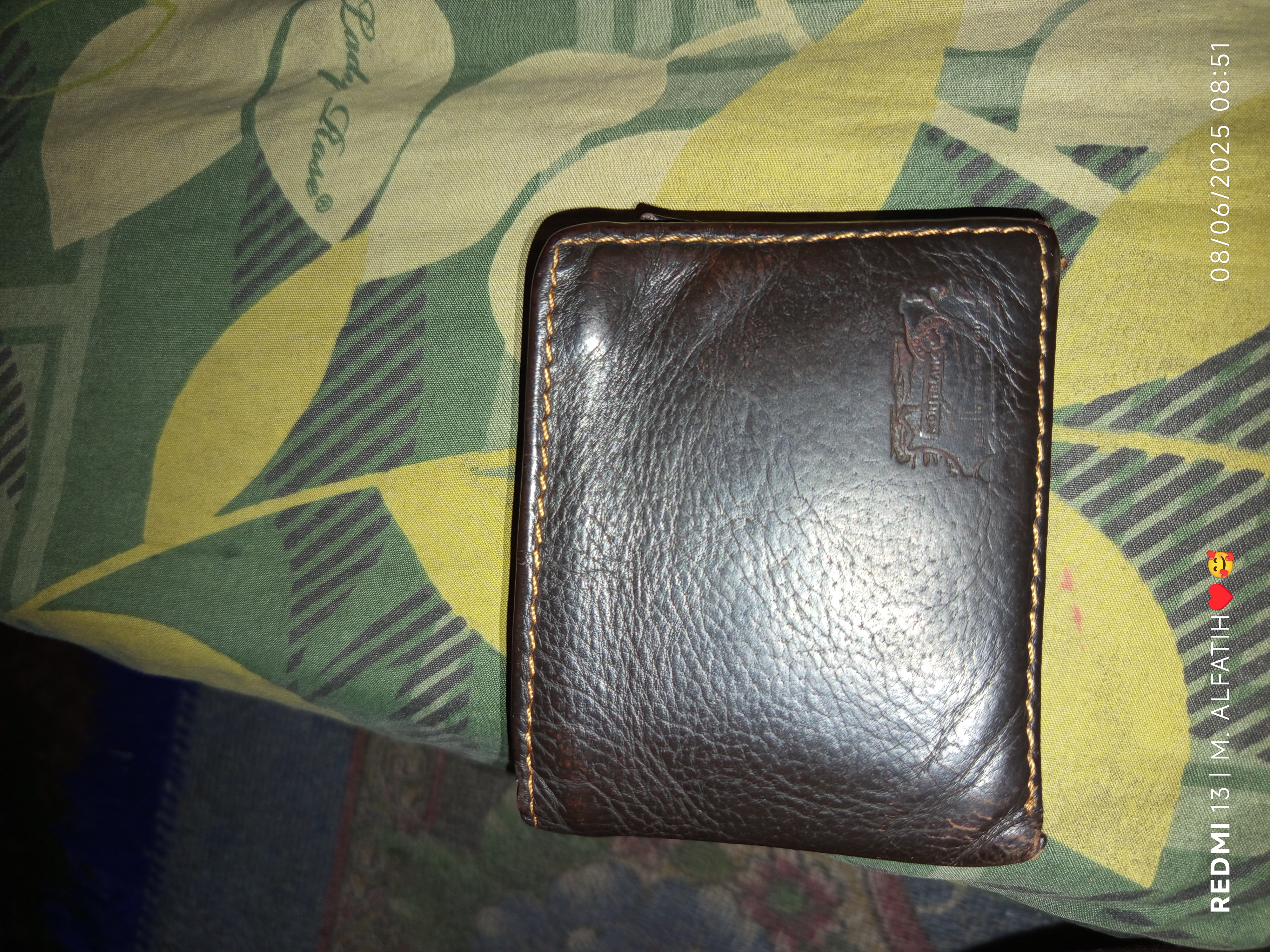 Foto laporan Dompet (TB0822)