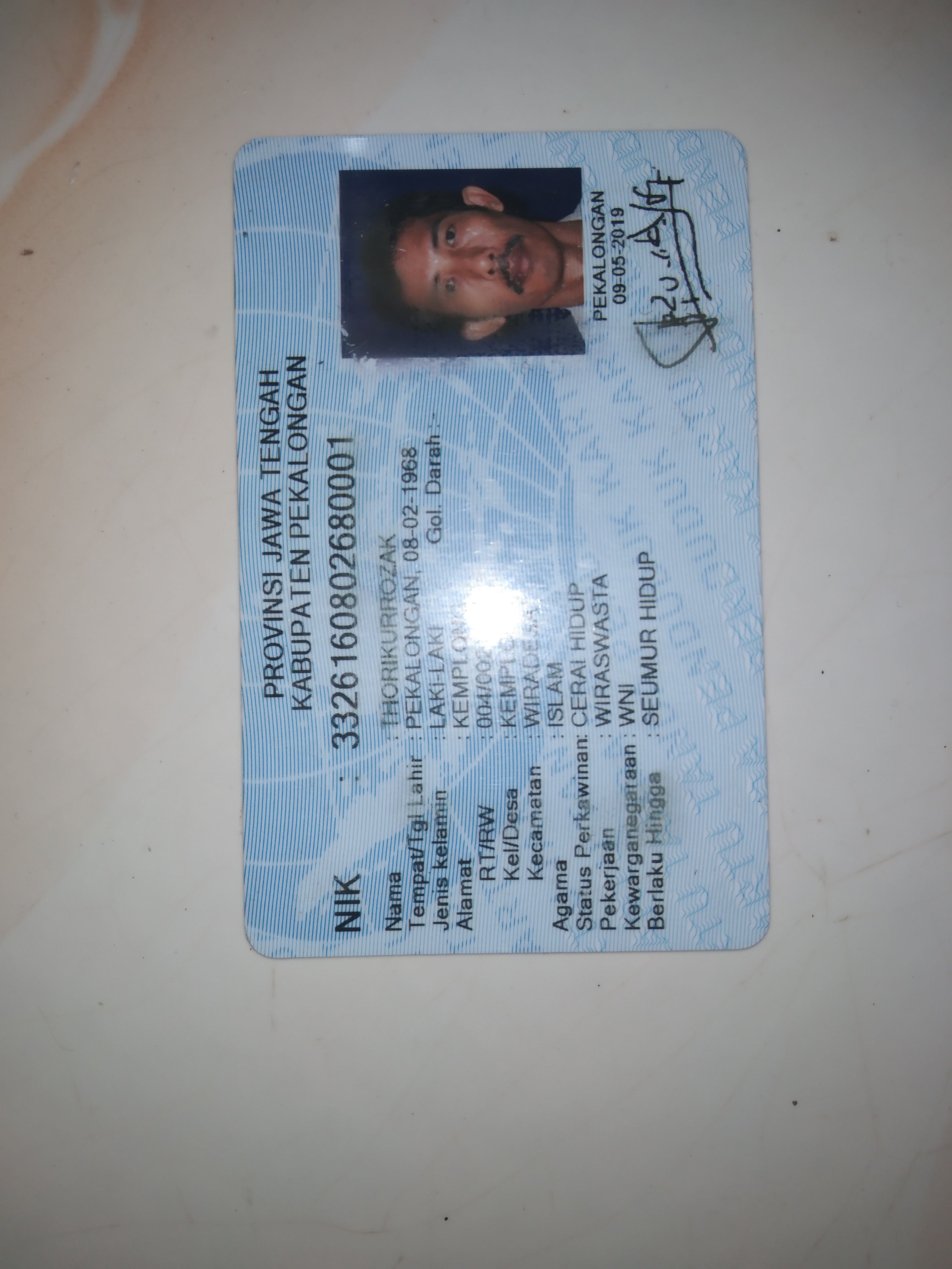 Foto laporan Dompet (TB0838)
