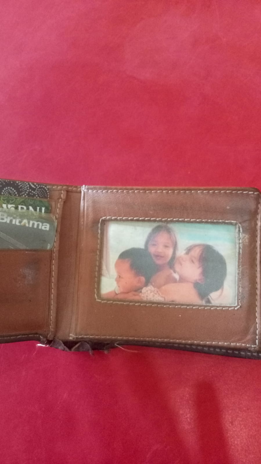 Foto laporan Dompet (TB0844)