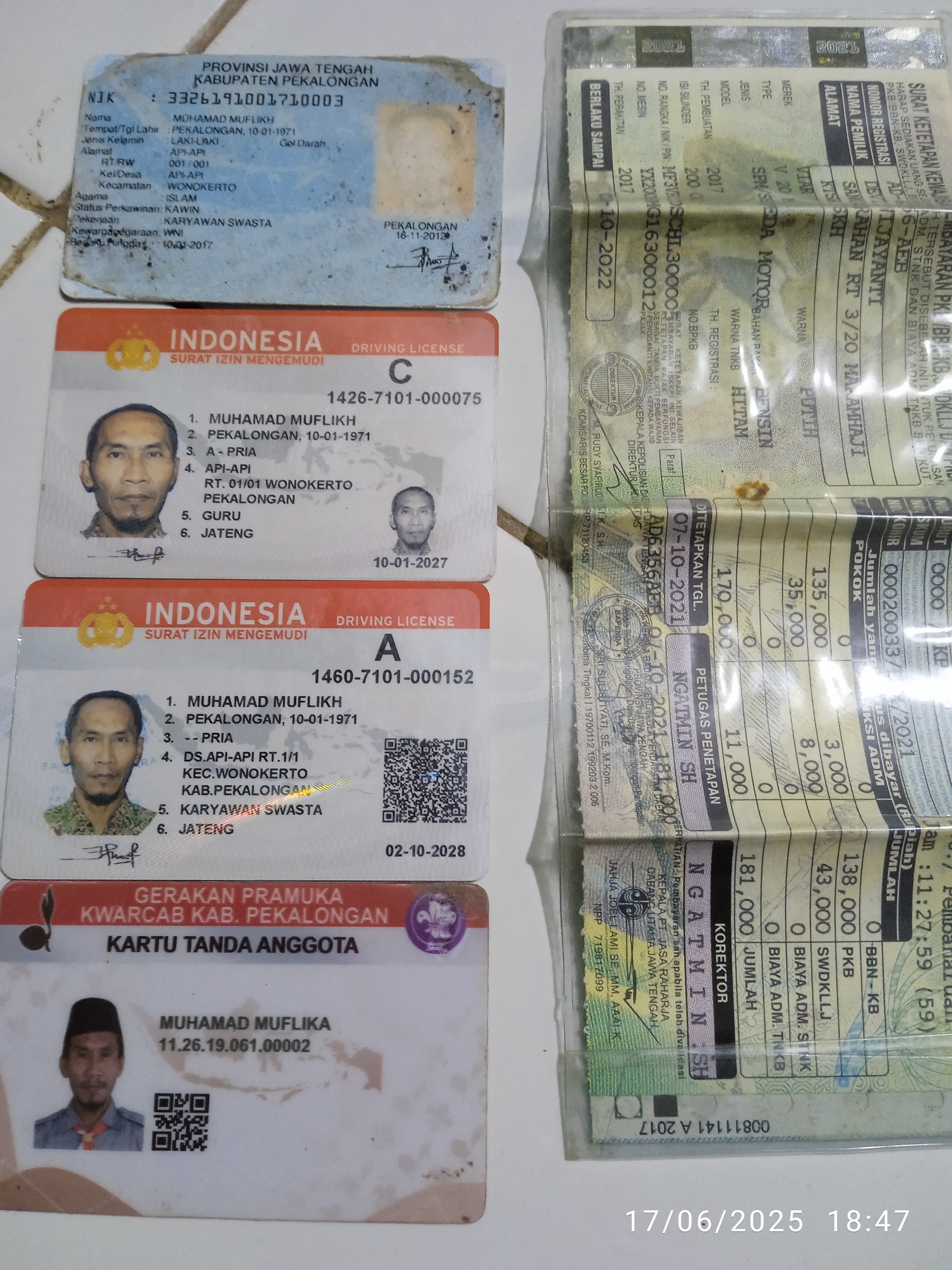 Foto laporan Dompet (TB0850)