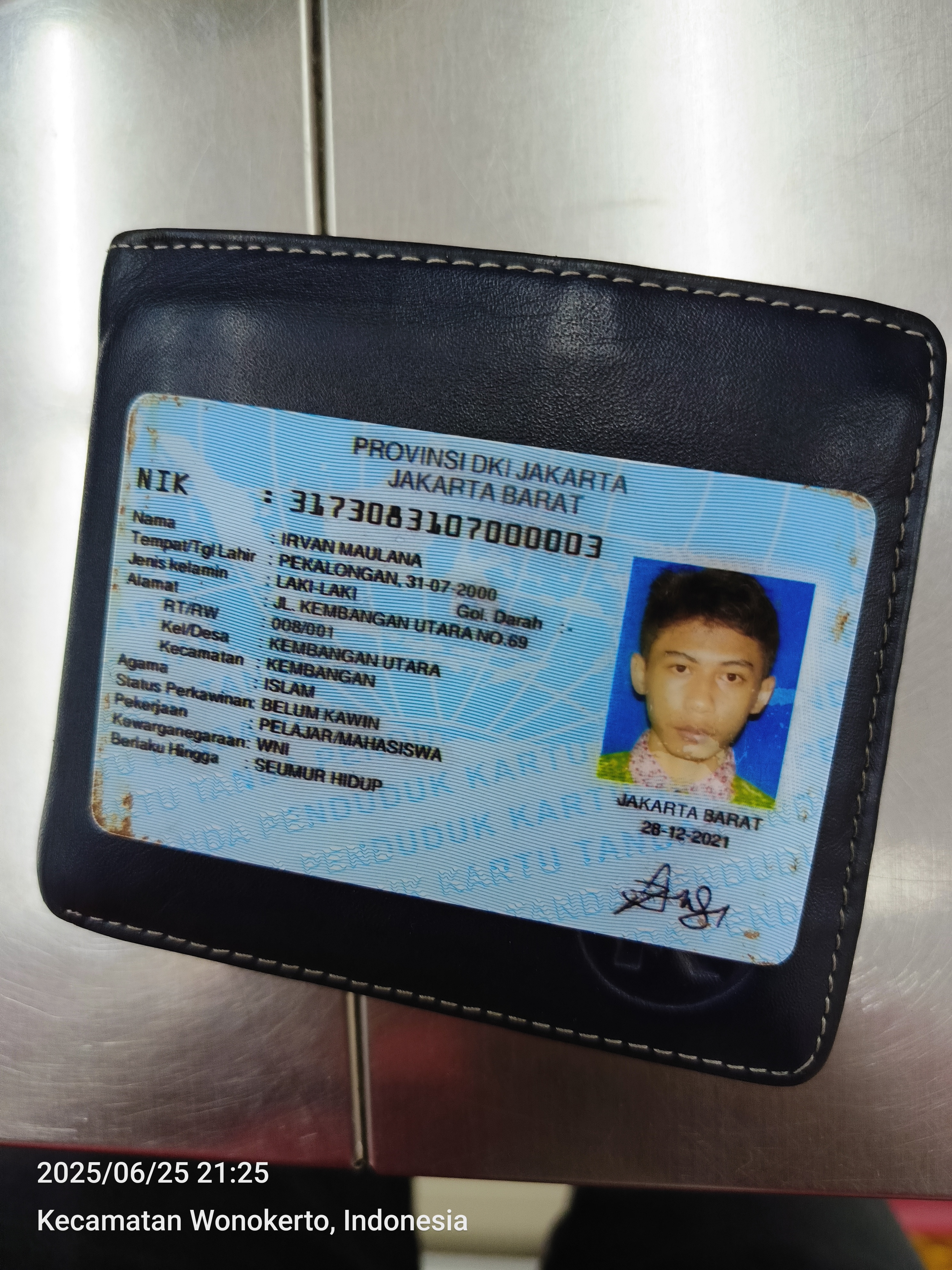 Foto laporan Dompet (TB0870)