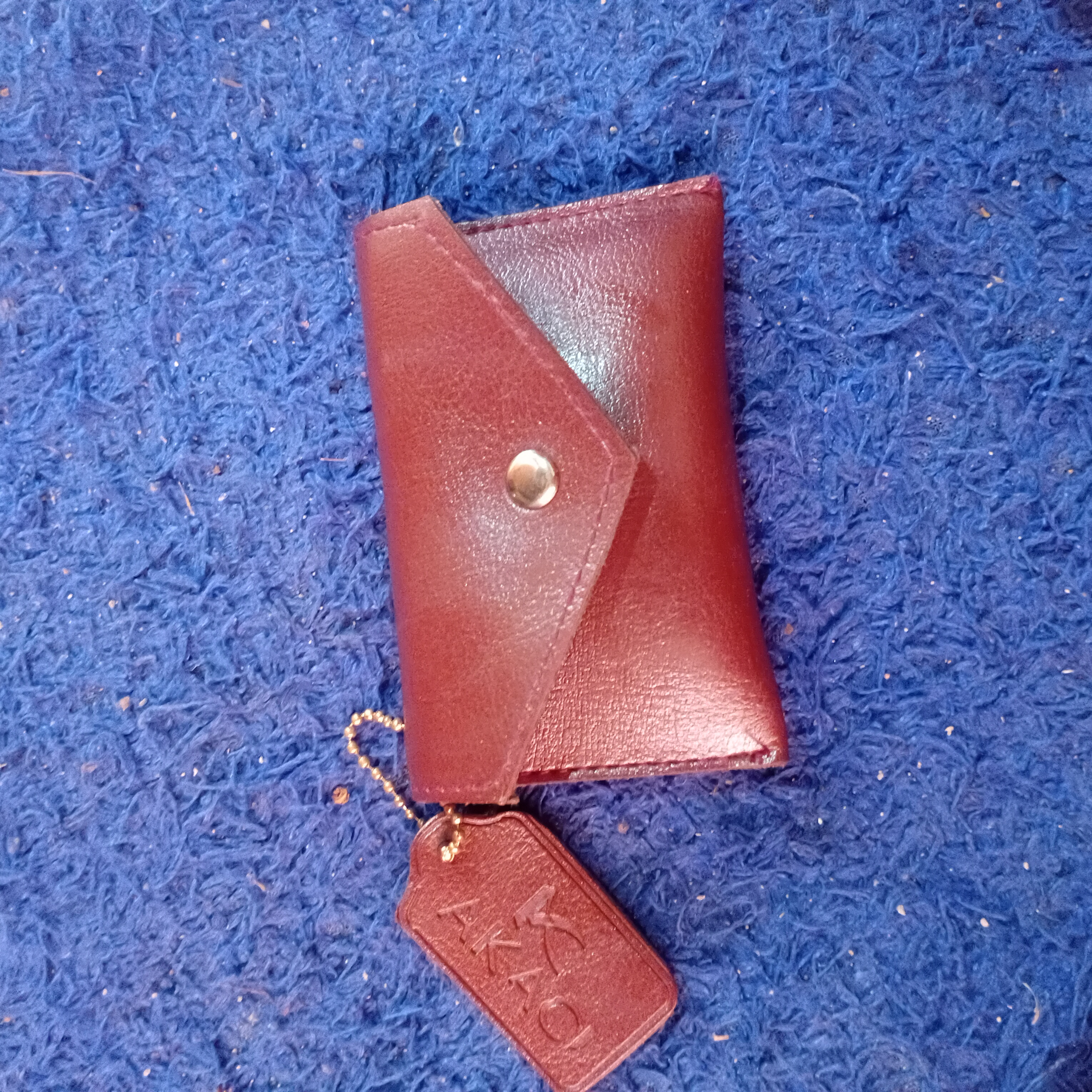 Foto laporan Dompet (TB0906)
