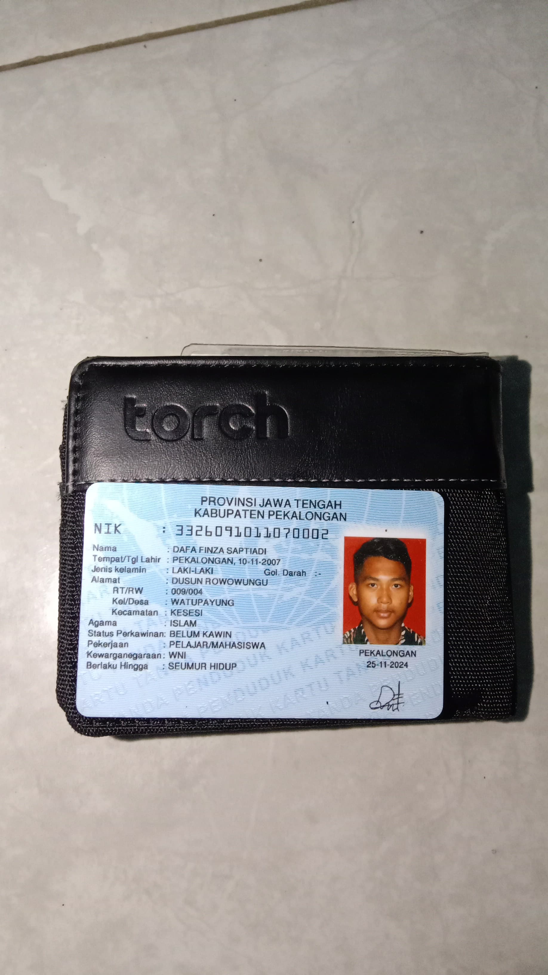Foto laporan Dompet (TB0910)
