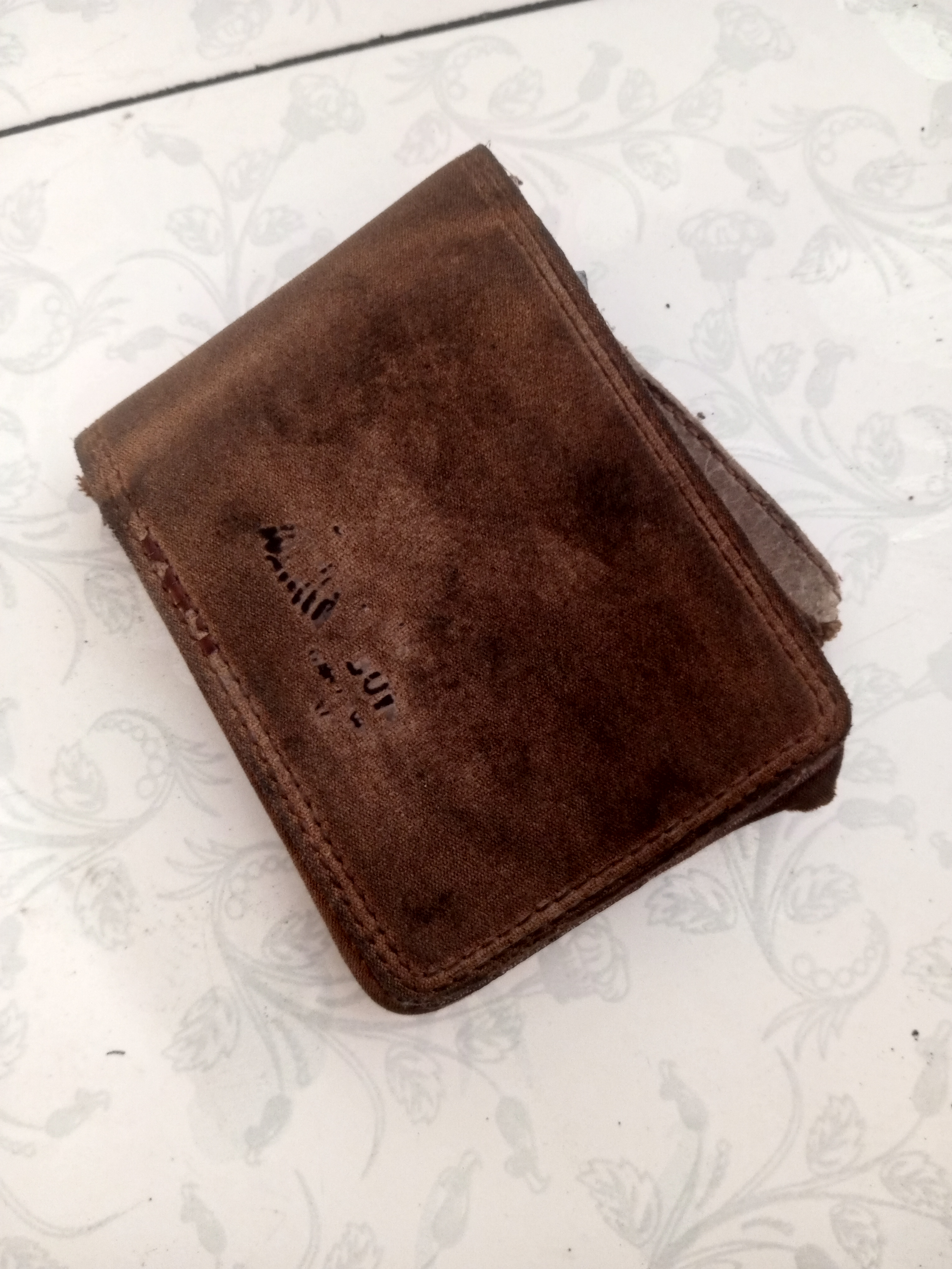 Foto laporan Dompet (TB0976)