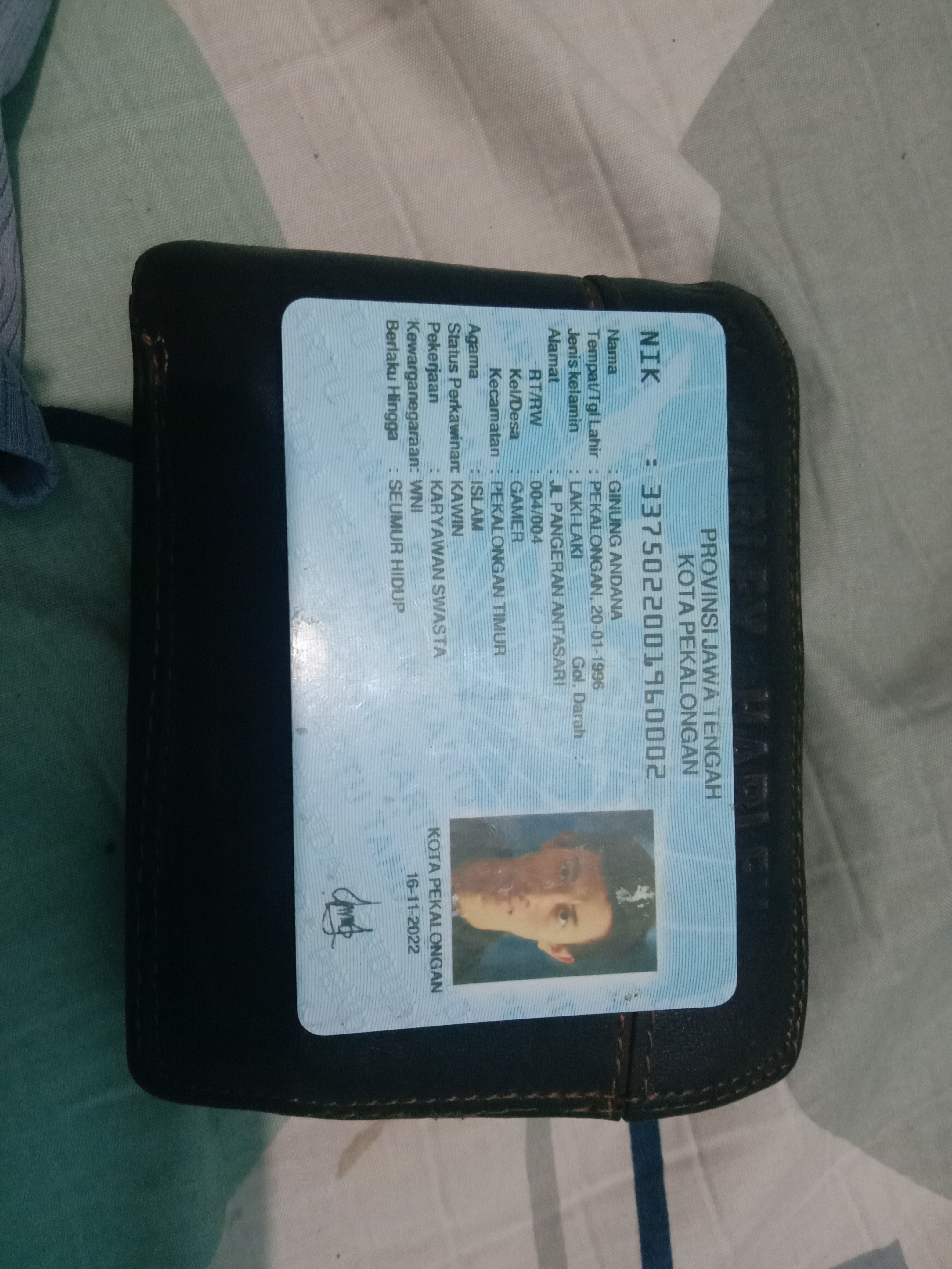 Foto laporan Dompet warna coklat (TB0977)