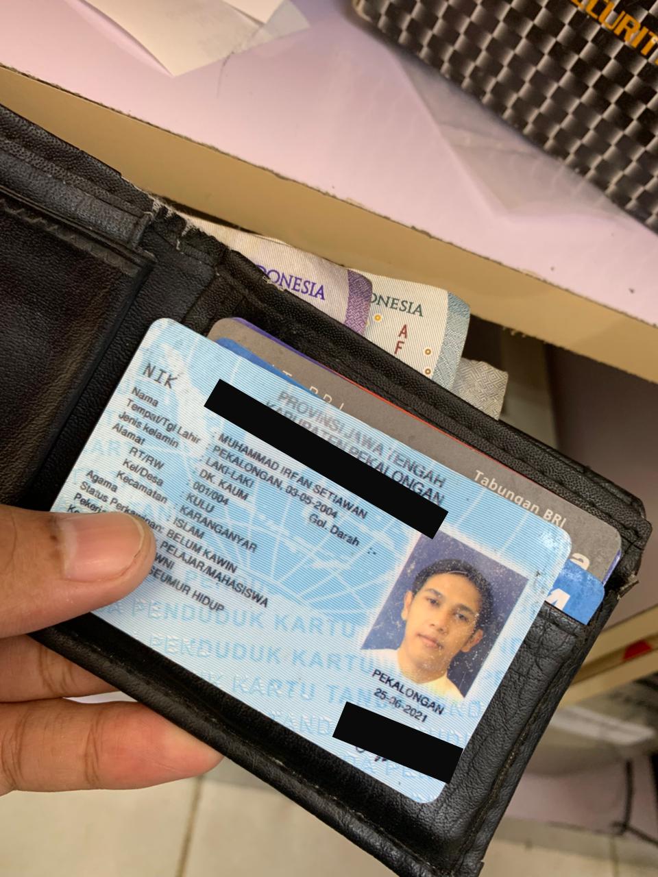 Foto laporan Dompet (TB0982)