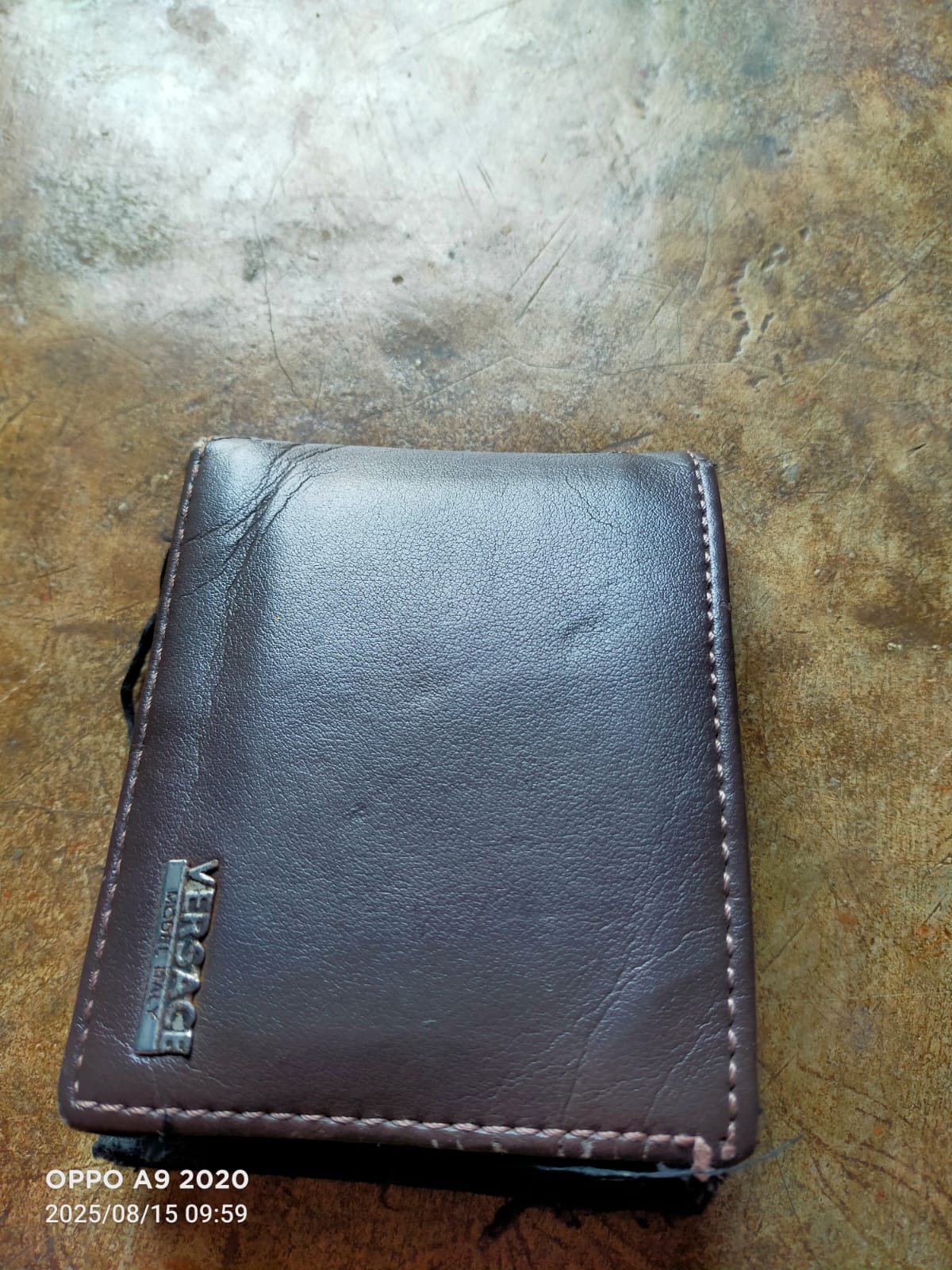 Foto laporan Dompet coklat (TB0983)