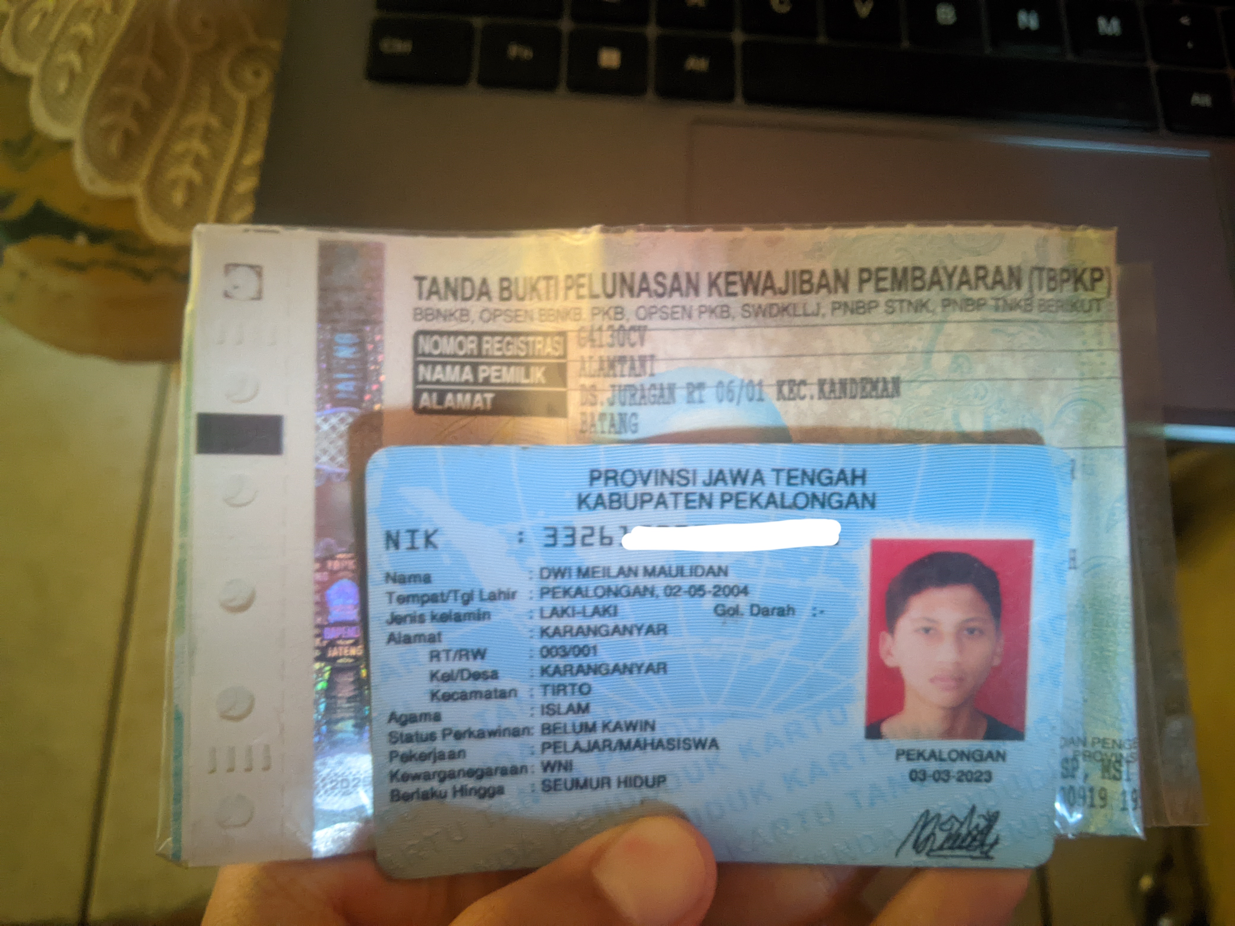 Foto laporan STNK dan KTP (TB0986)