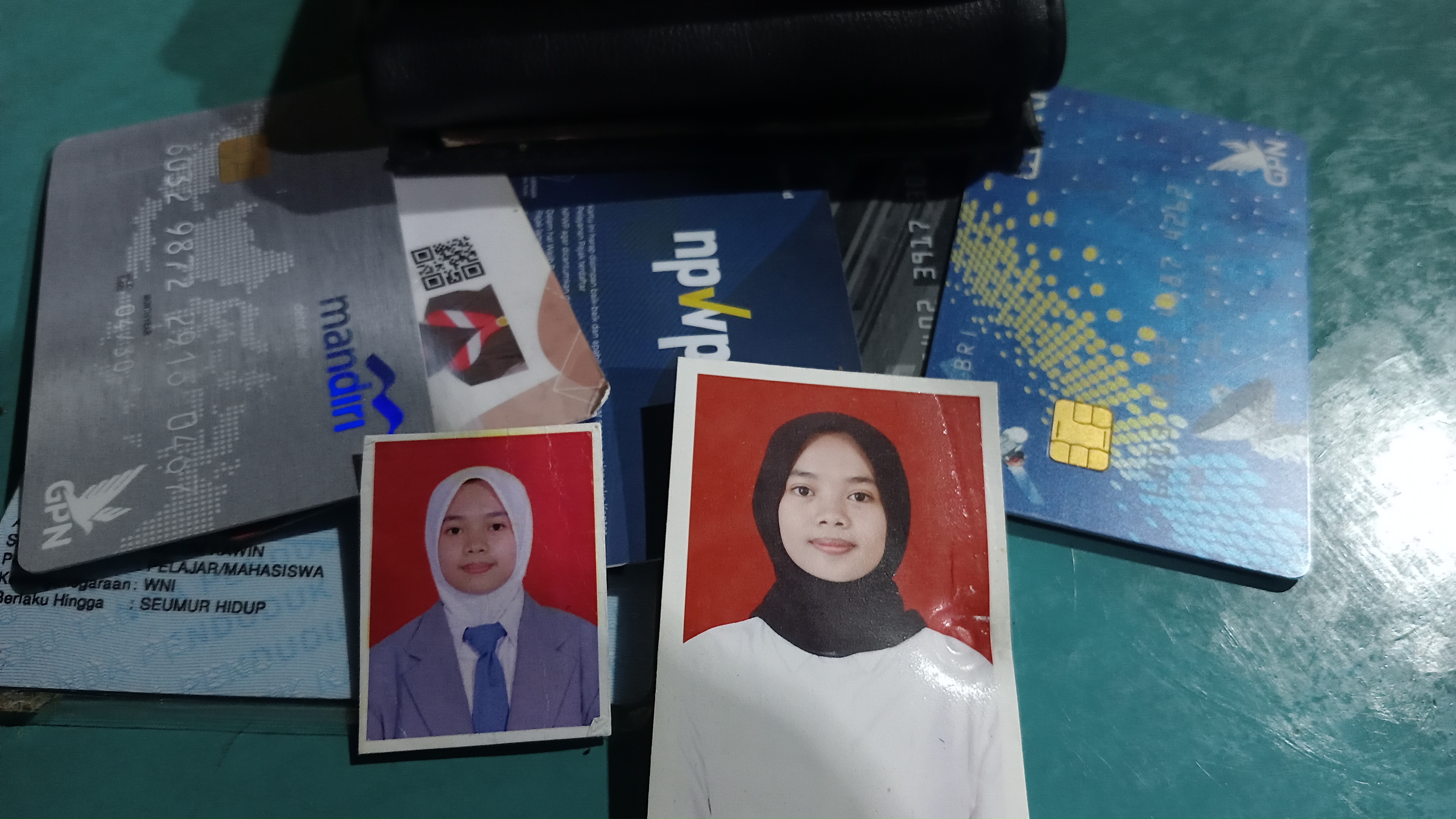 Foto laporan Dompet (TB0987)