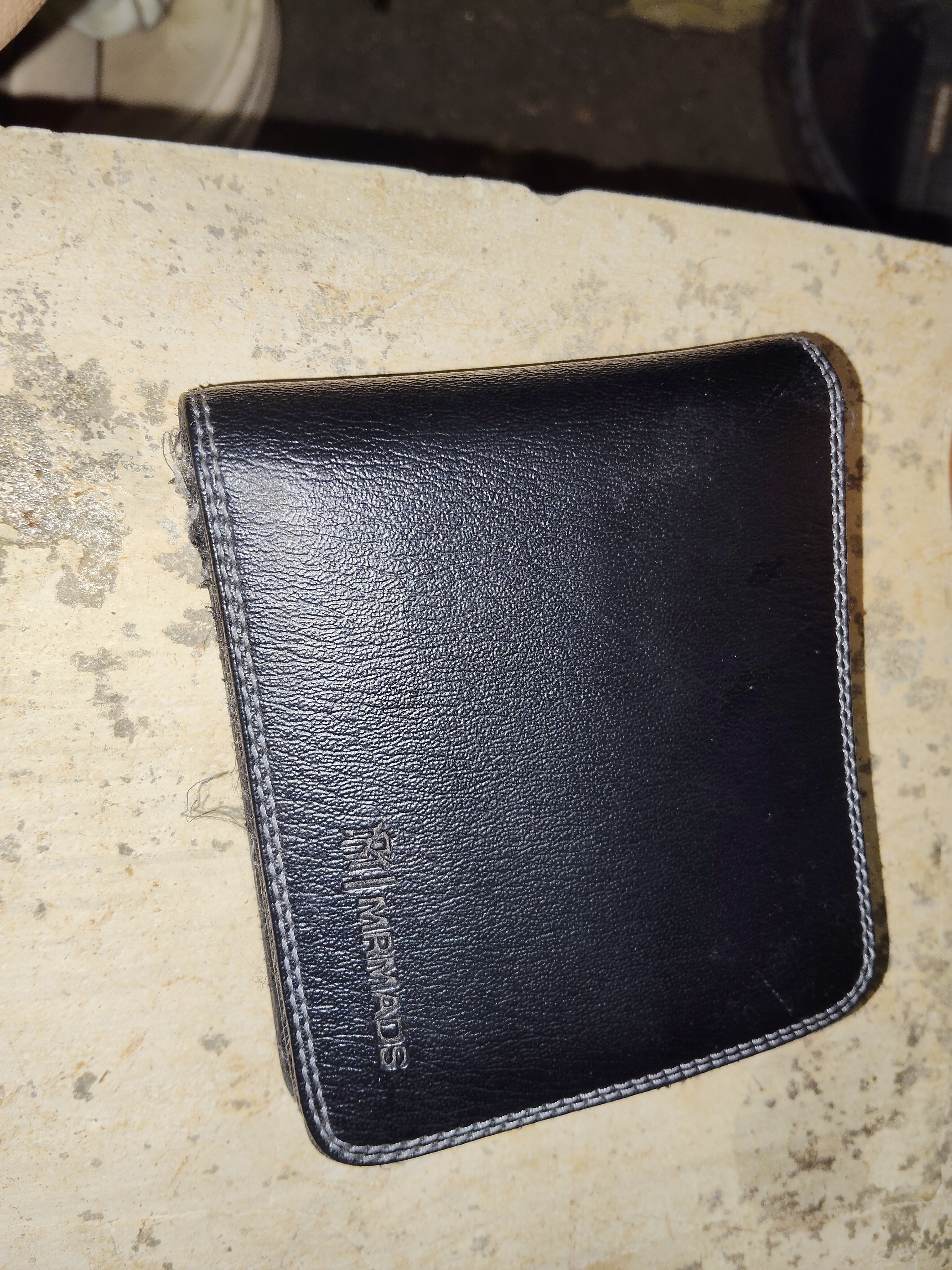 Foto laporan Dompet dan isinya (TB1009)