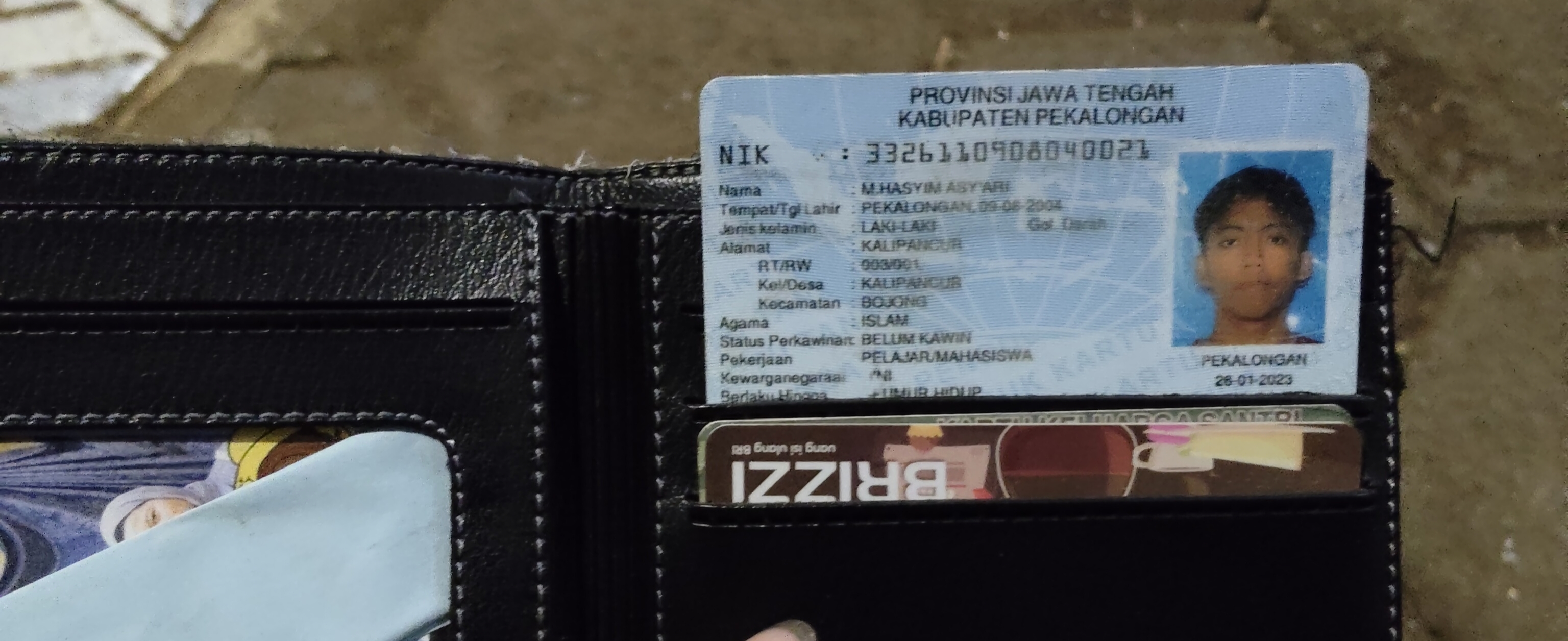 Foto laporan Dompet hitam (TB1010)