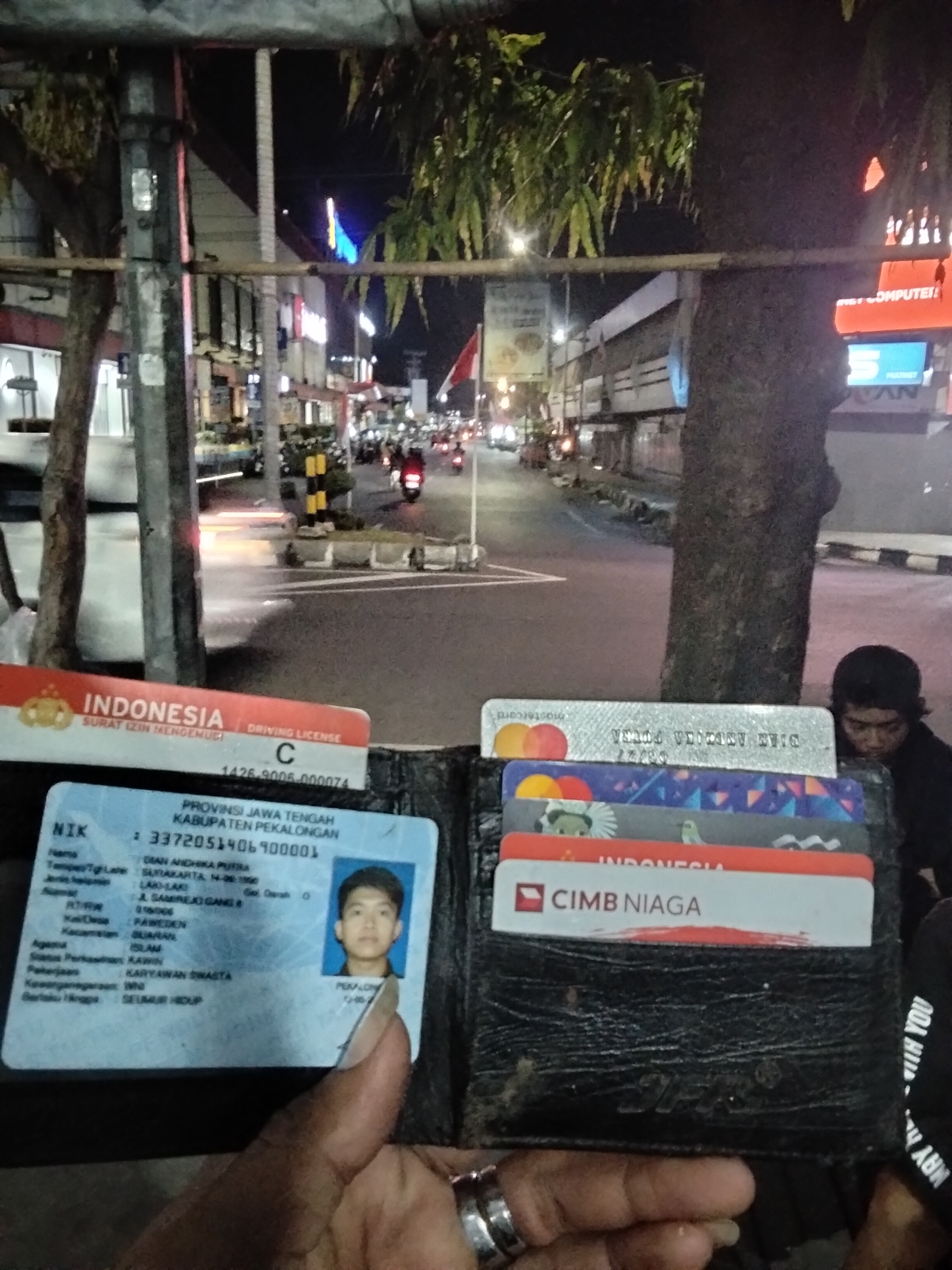 Foto laporan Dompet (TB1014)