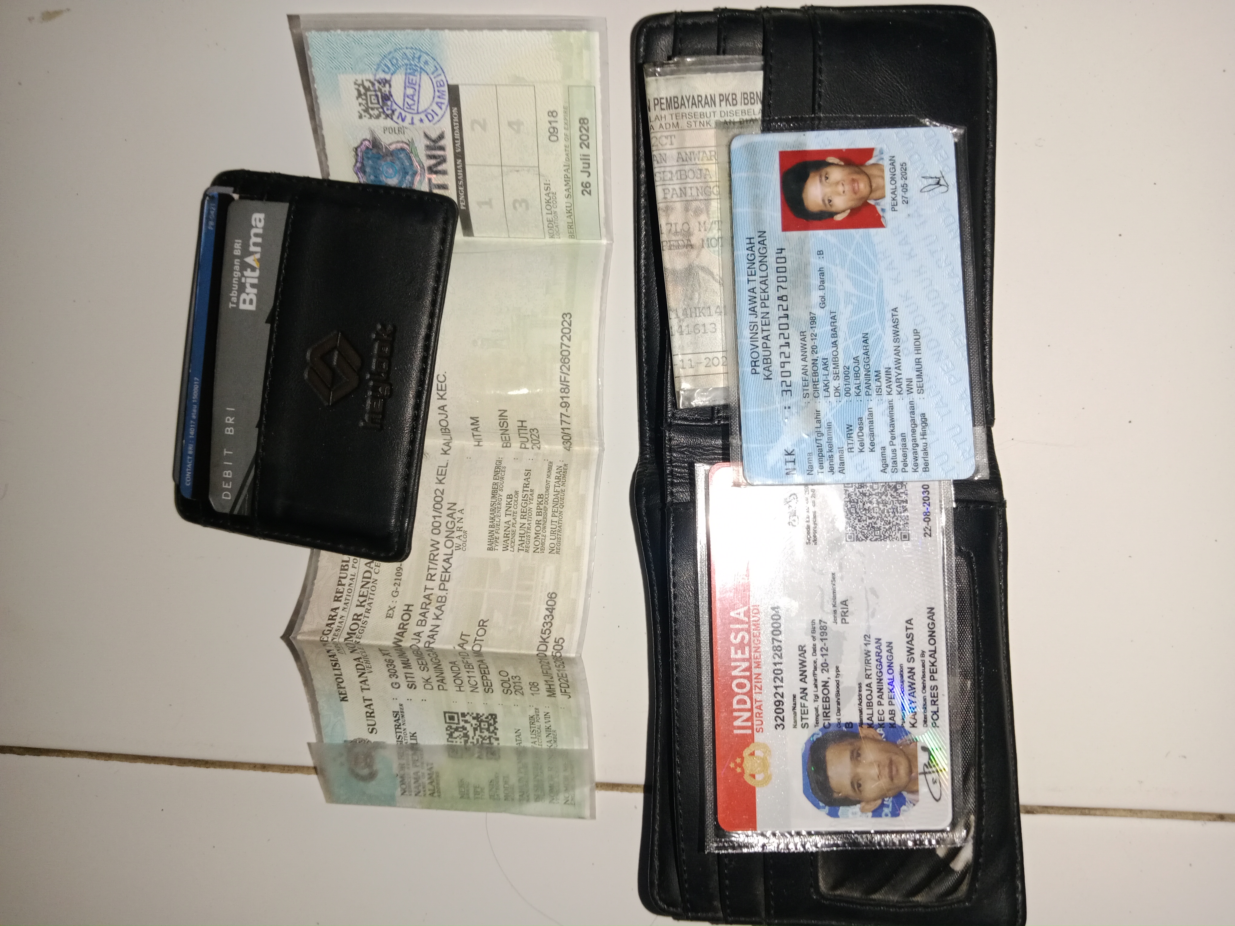 Foto laporan Dompet warna hitam (TB1024)