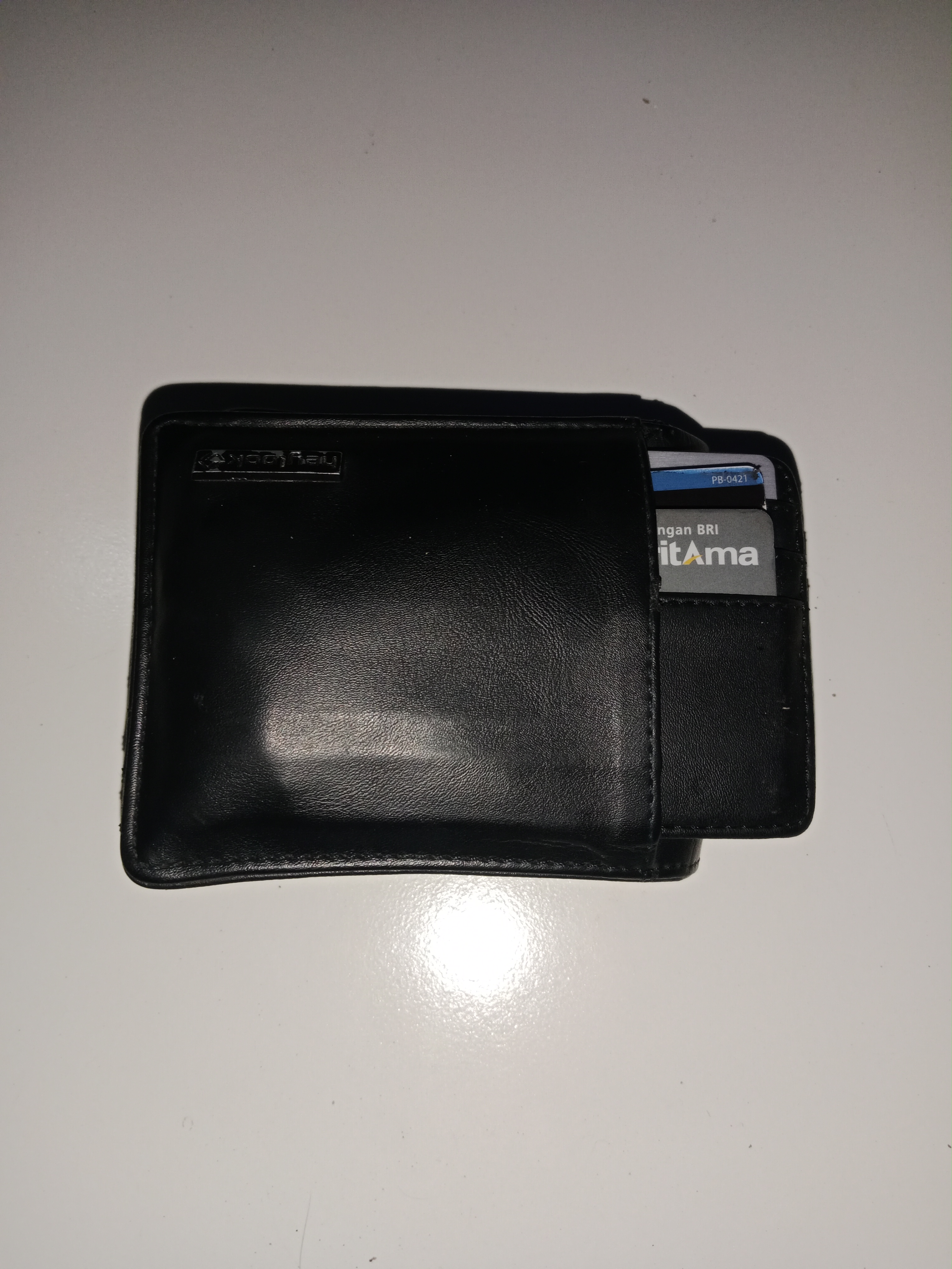 Foto laporan Dompet warna hitam (TB1025)