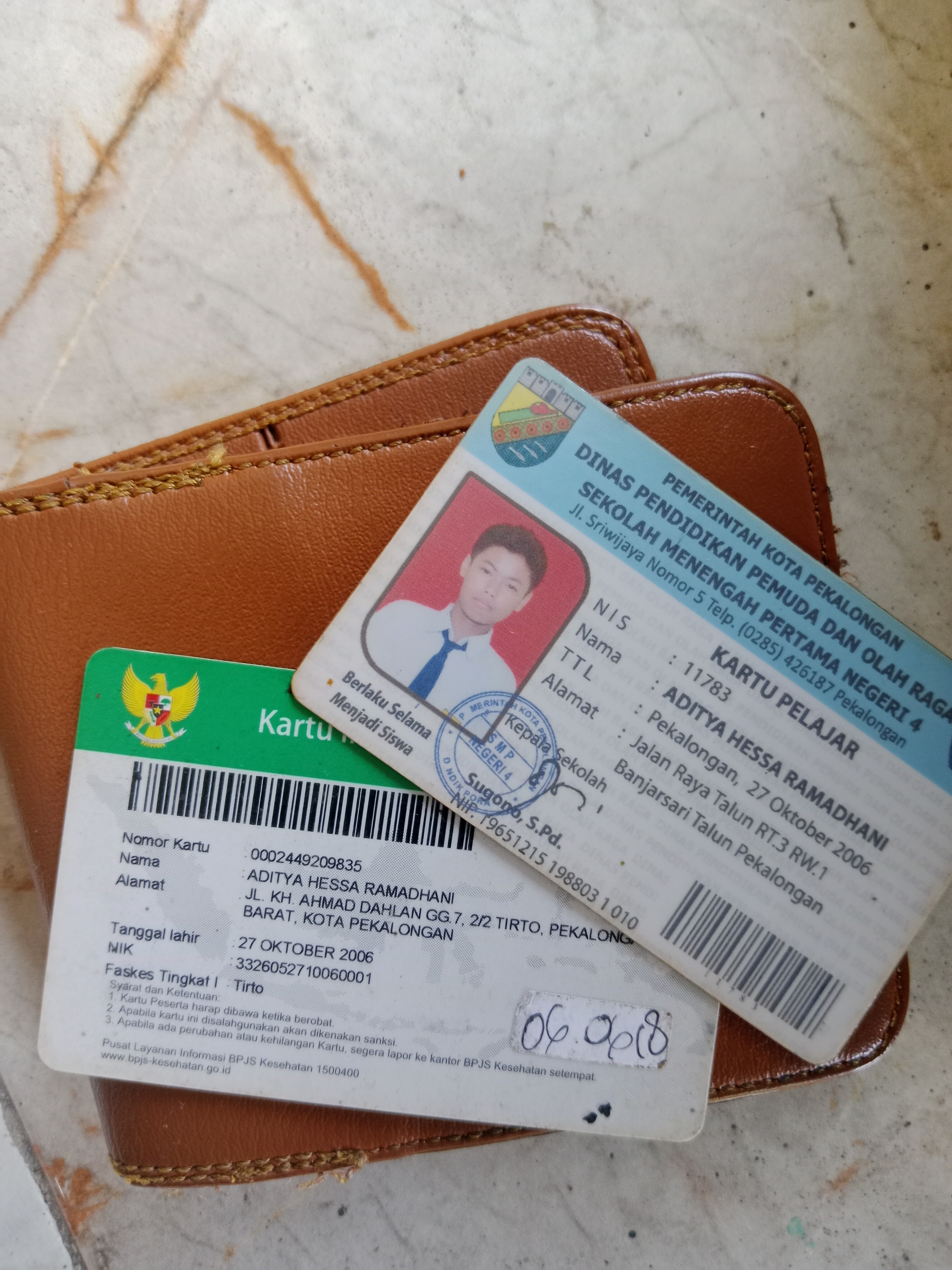 Foto laporan dompet ktp bbjs kartu pelajar (TB1026)