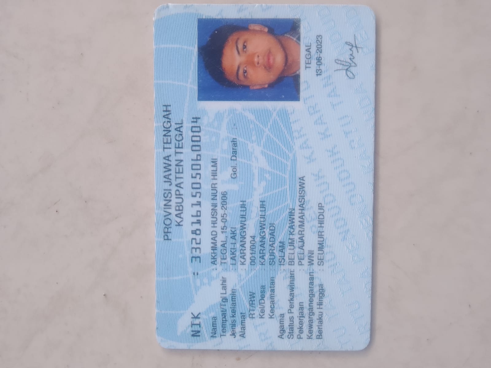 Foto laporan Dompet (TB1045)