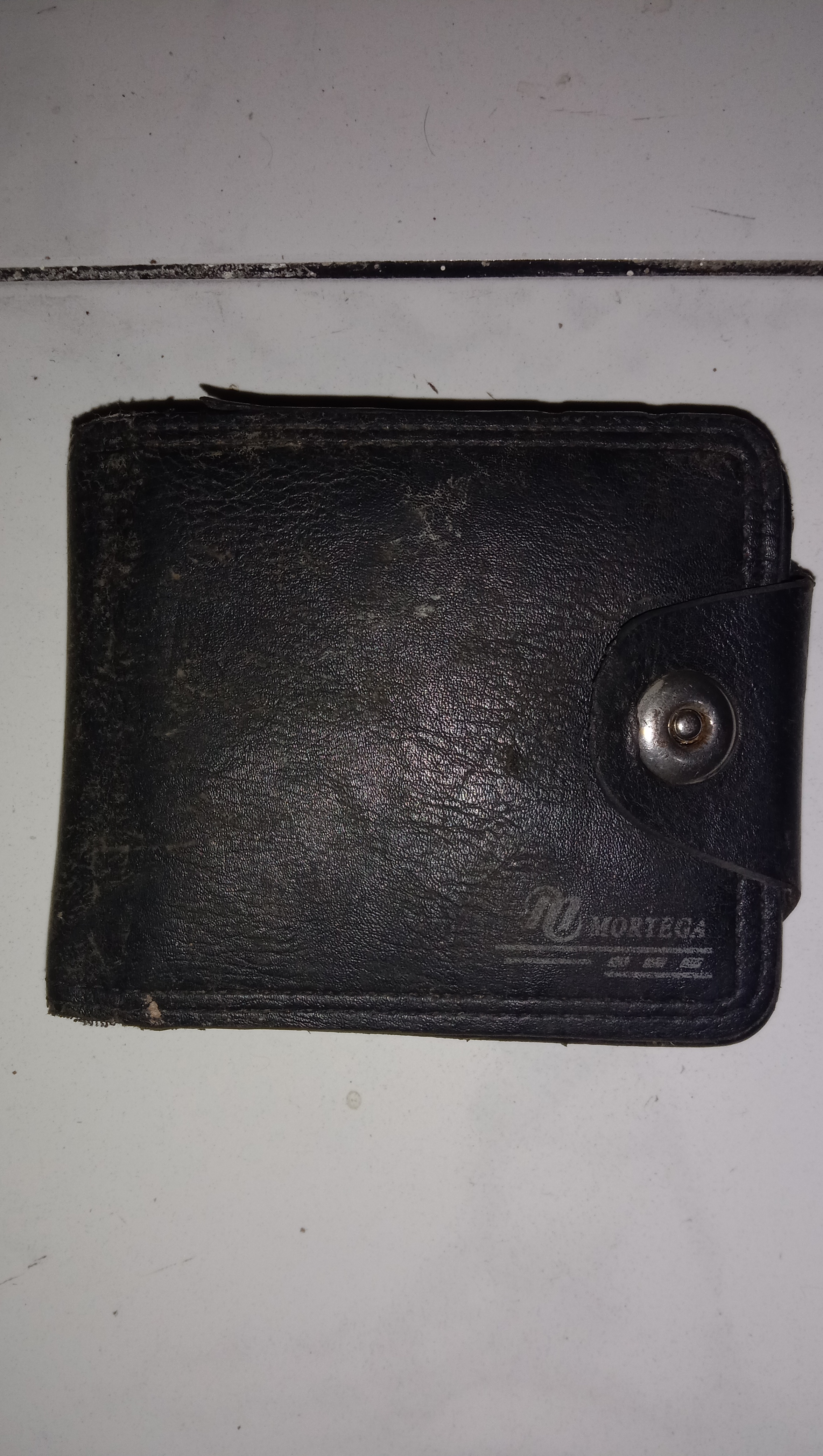 Foto laporan Dompet berwarna hitam (TB1058)