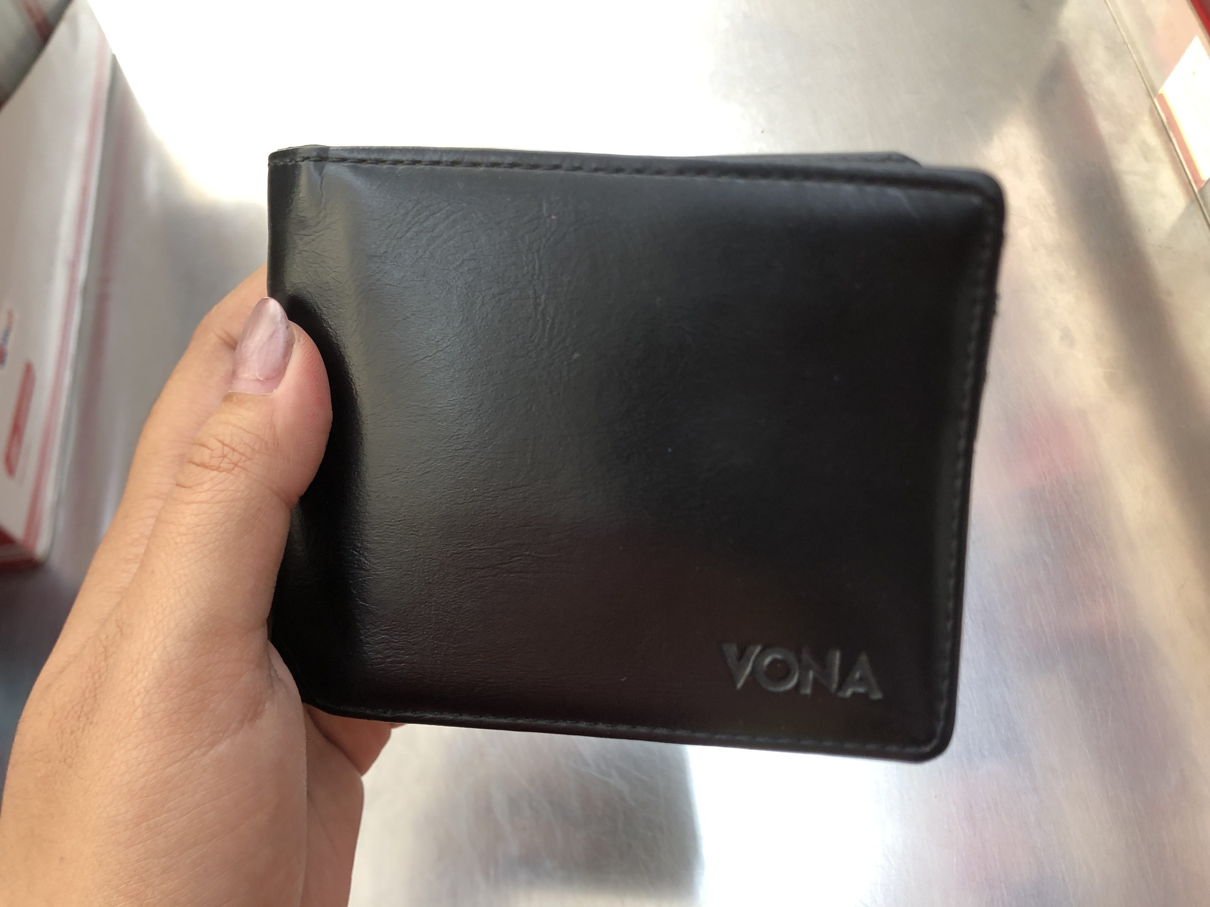 Foto laporan Dompet hitam (TB1090)