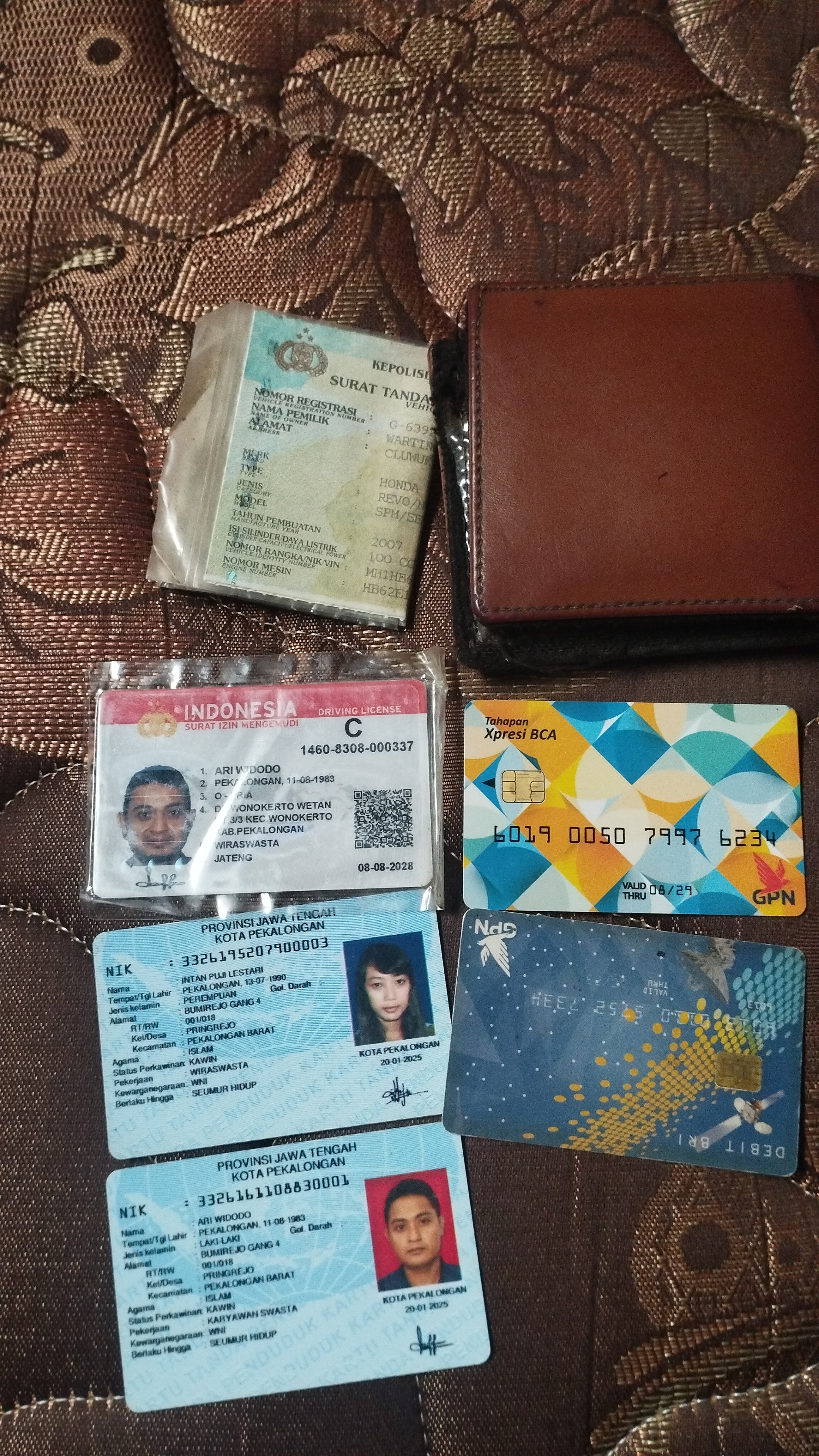 Foto laporan dompet dan berisi ktp, sim, atm ( tidak ada uang) (TB1100)