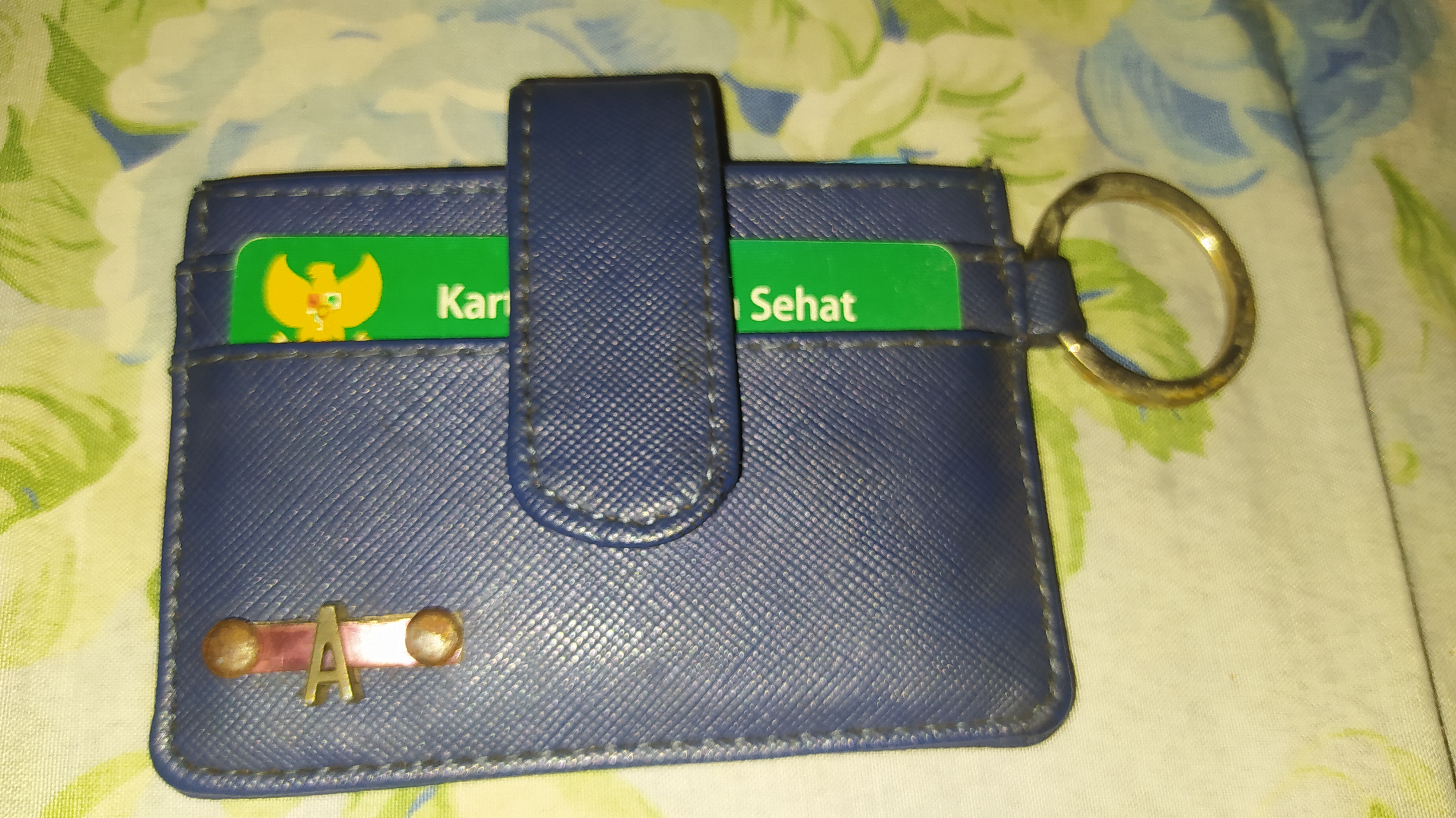 Foto laporan Dompet (TB1104)