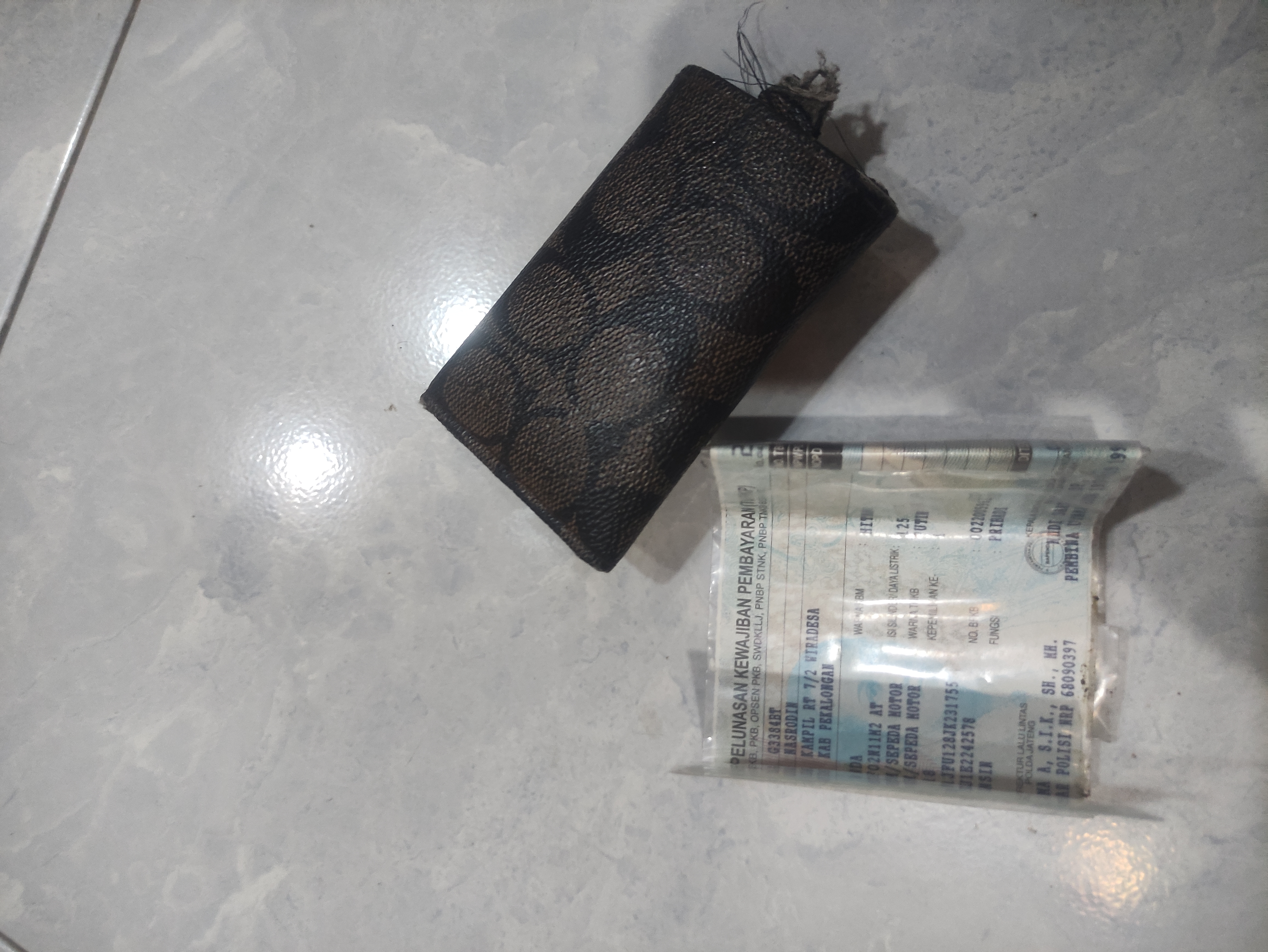 Foto laporan Gantungan kunci (DOMPET) (TB1151)