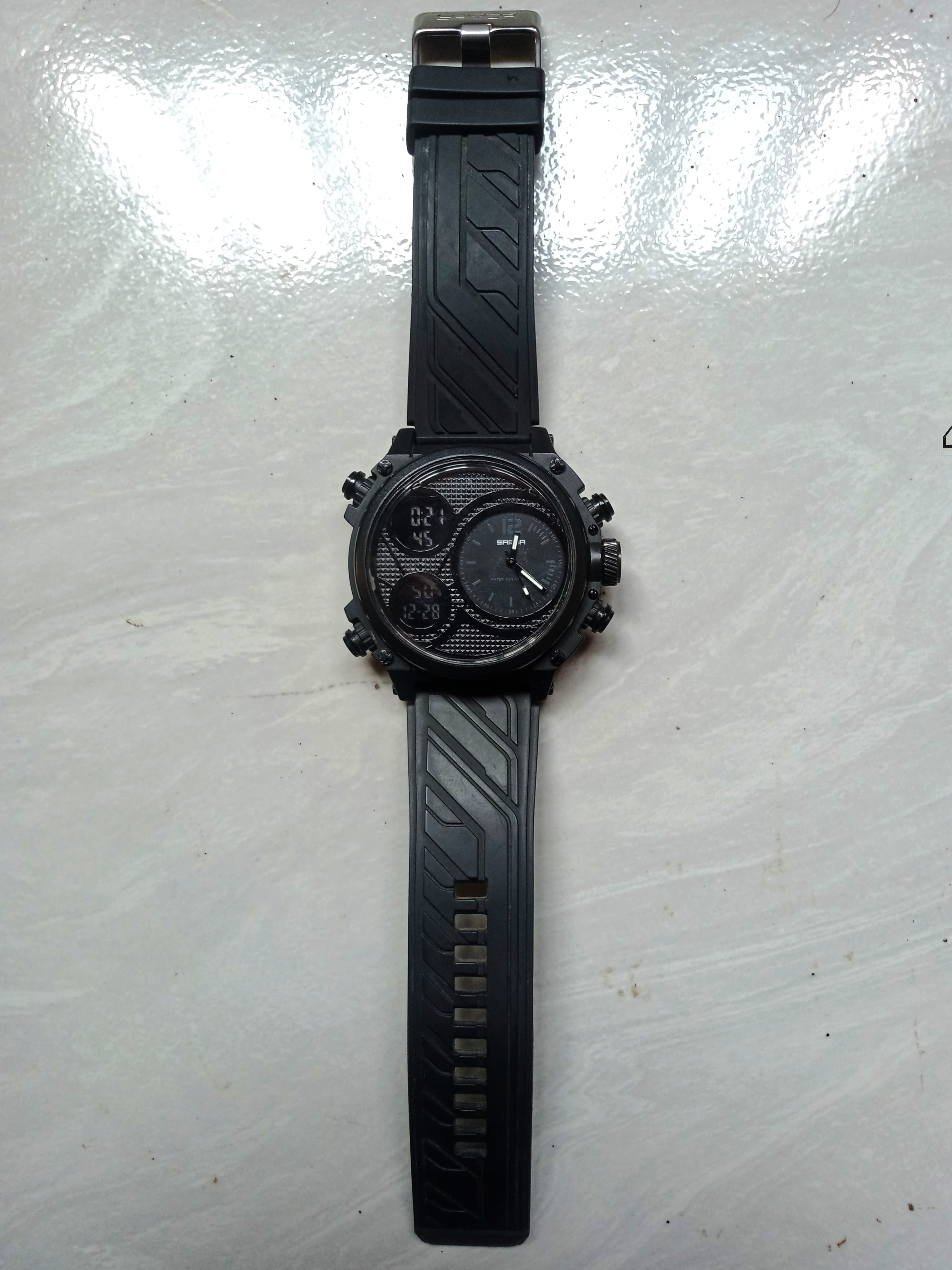 Foto laporan Jam tangan (TB1208)