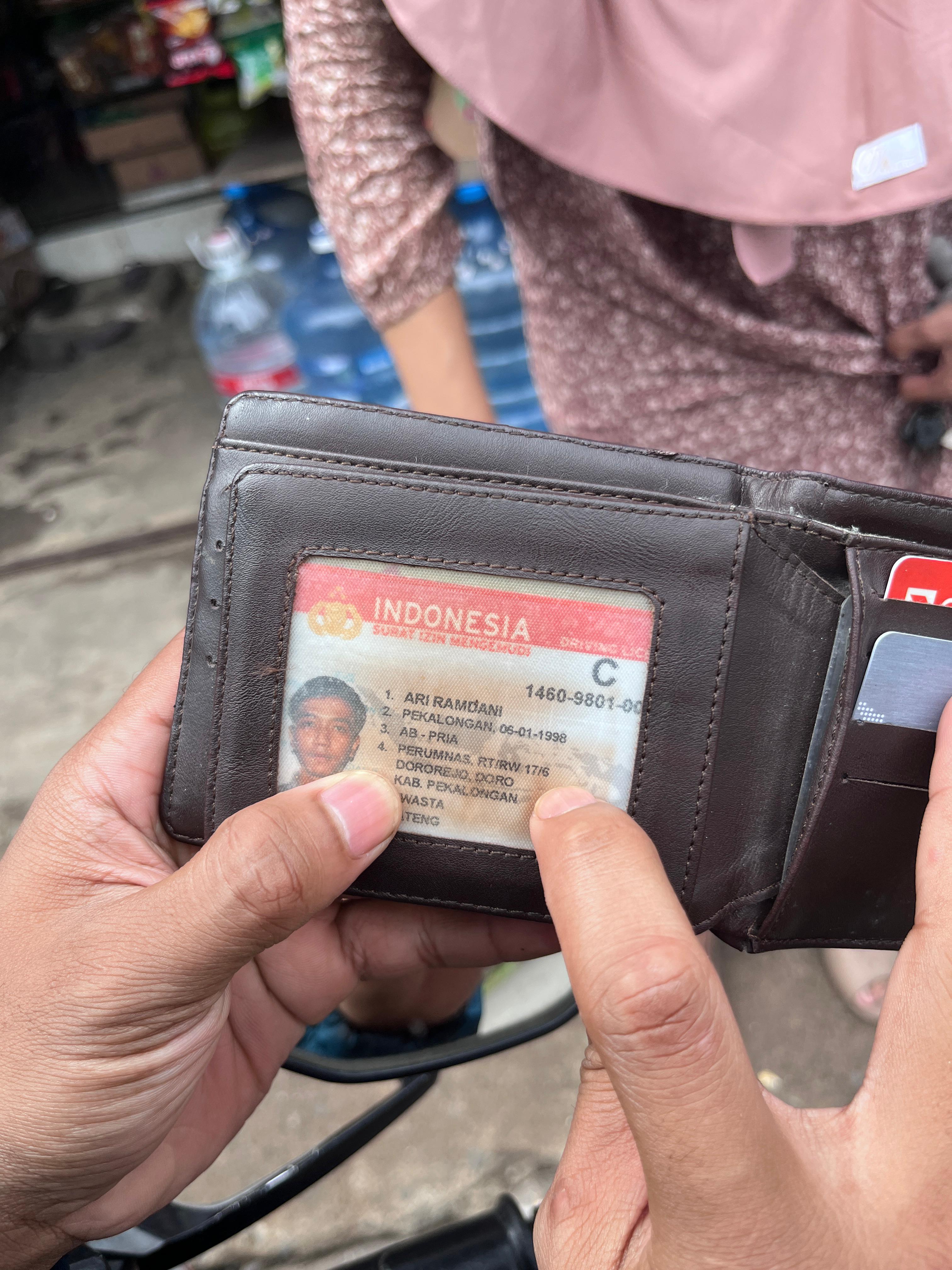 Foto laporan Dompet (TB1218)
