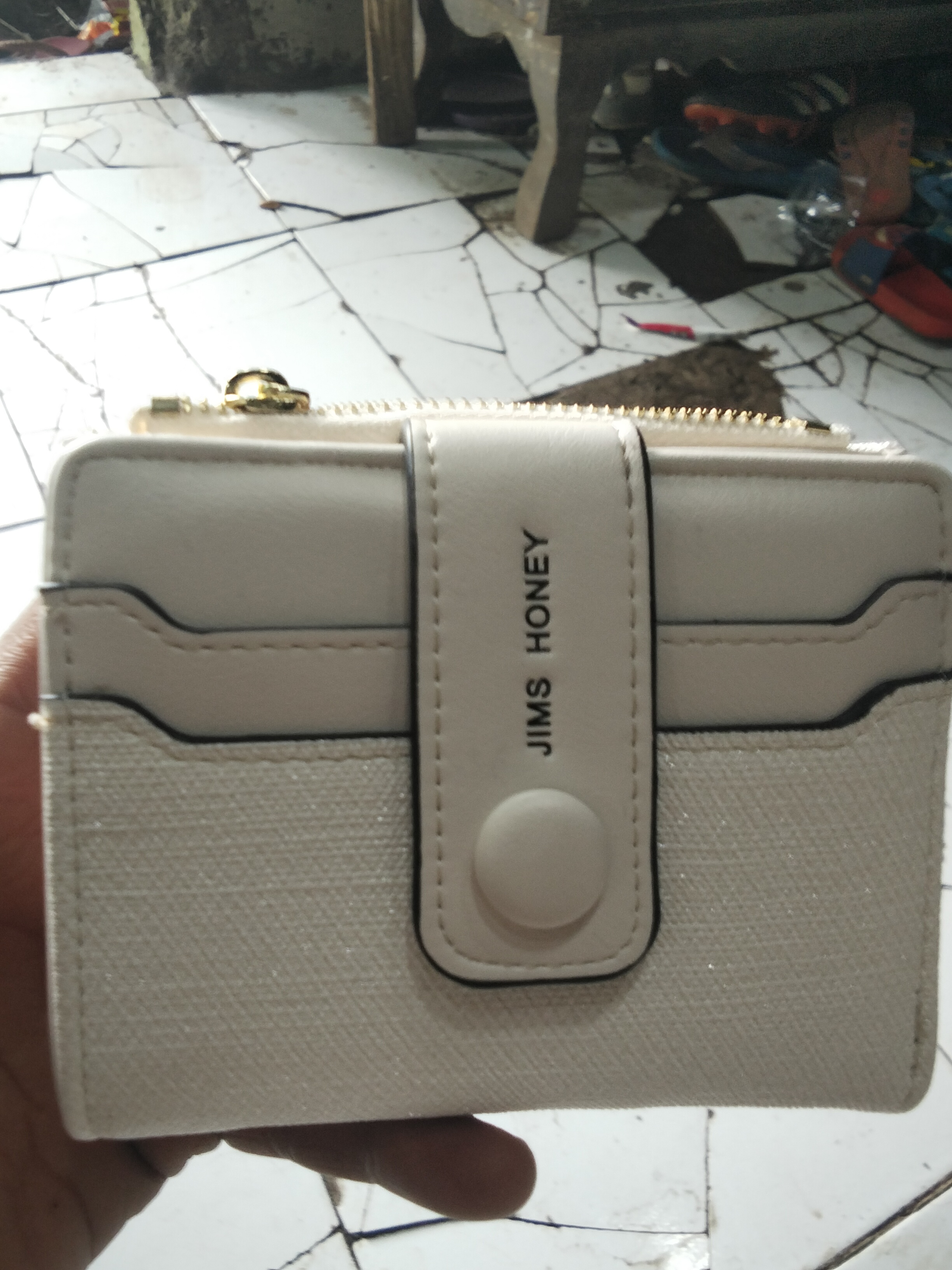 Foto laporan Dompet beserta isiny (TB1238)
