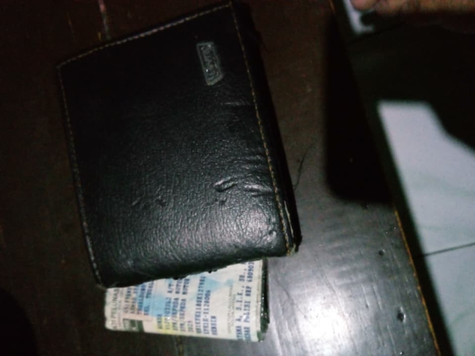 Foto laporan Dompet (TB1253)