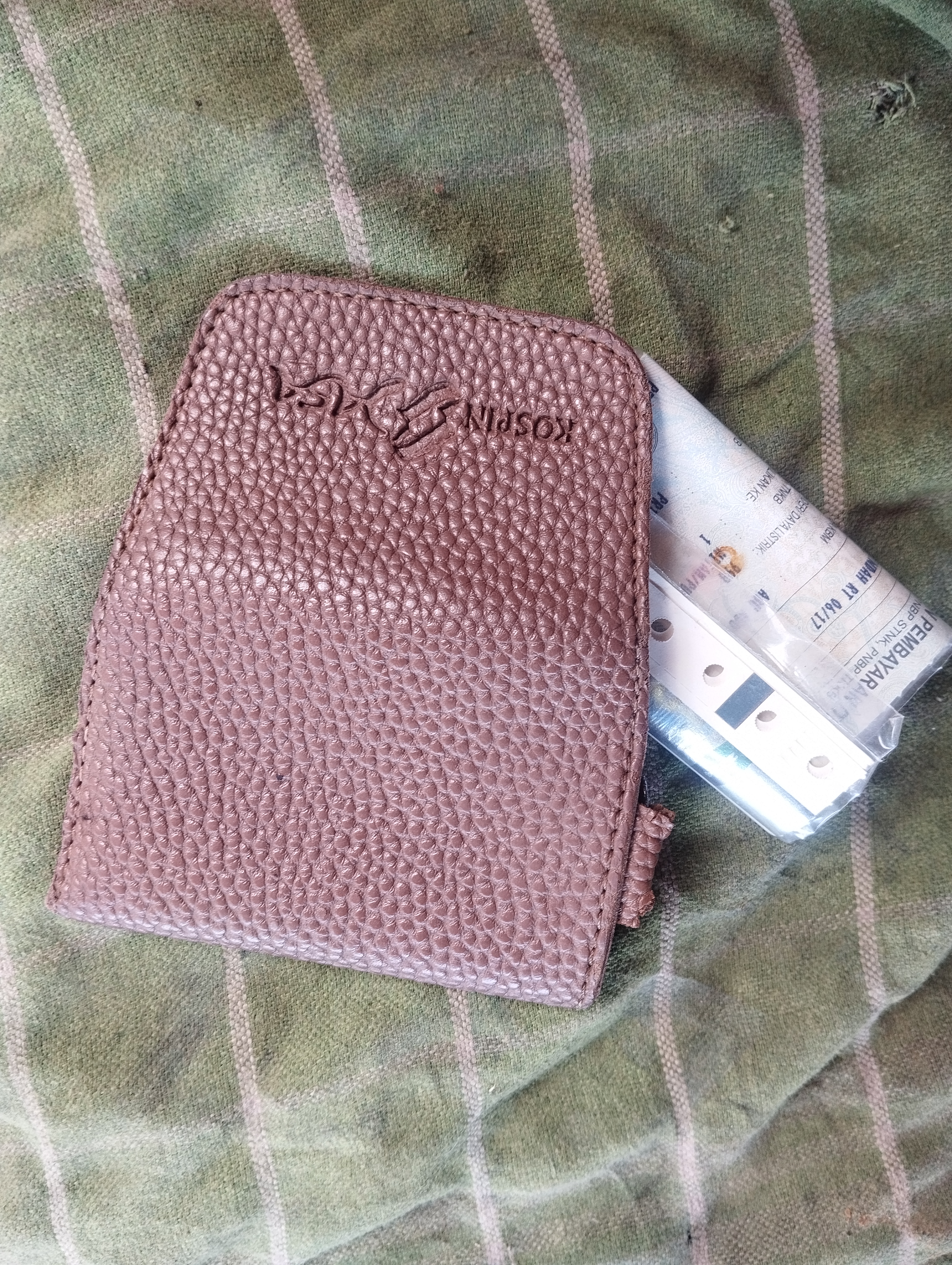 Foto laporan dompet coklat + STNK (TB1259)
