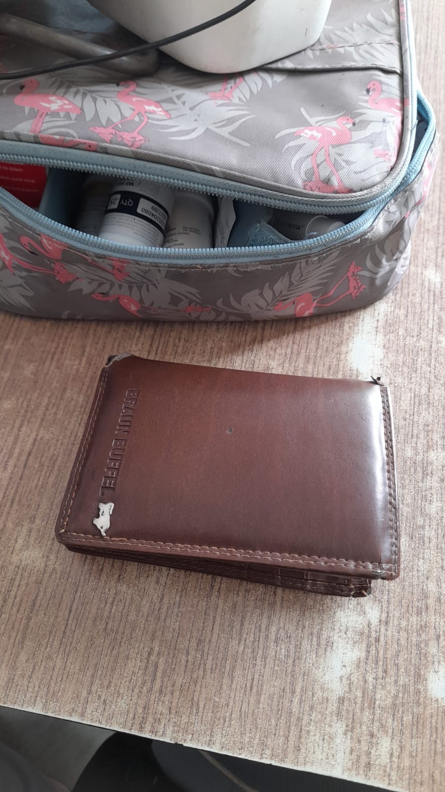 Foto laporan Dompet coklat (TB1285)
