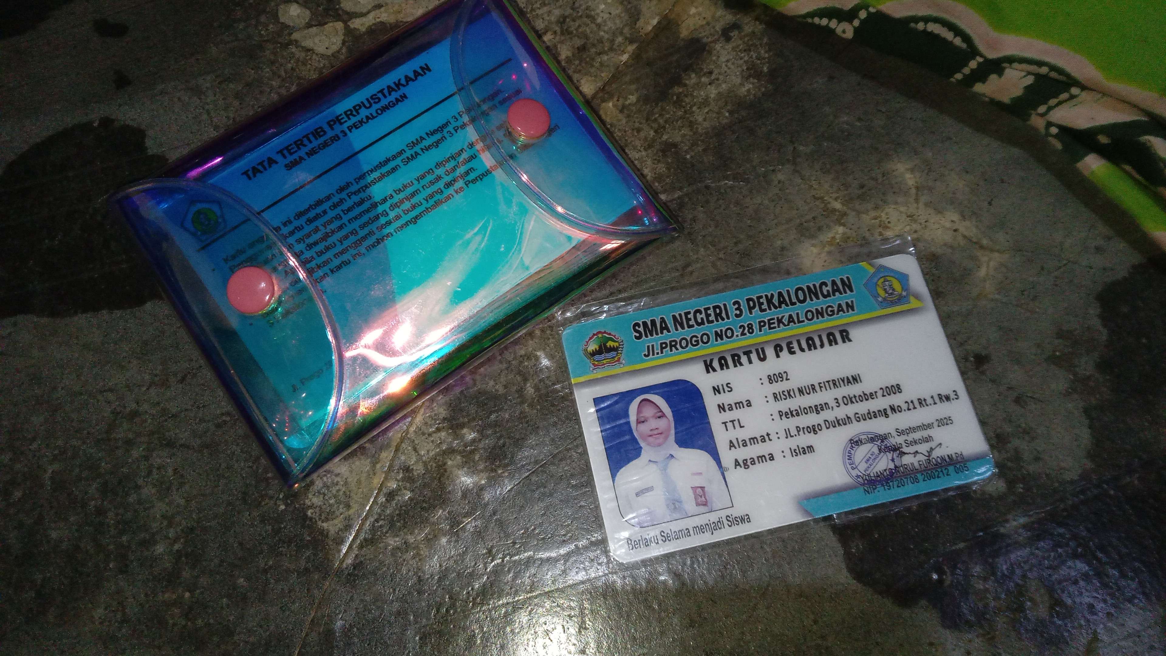 Foto laporan Dompet (TB1310)