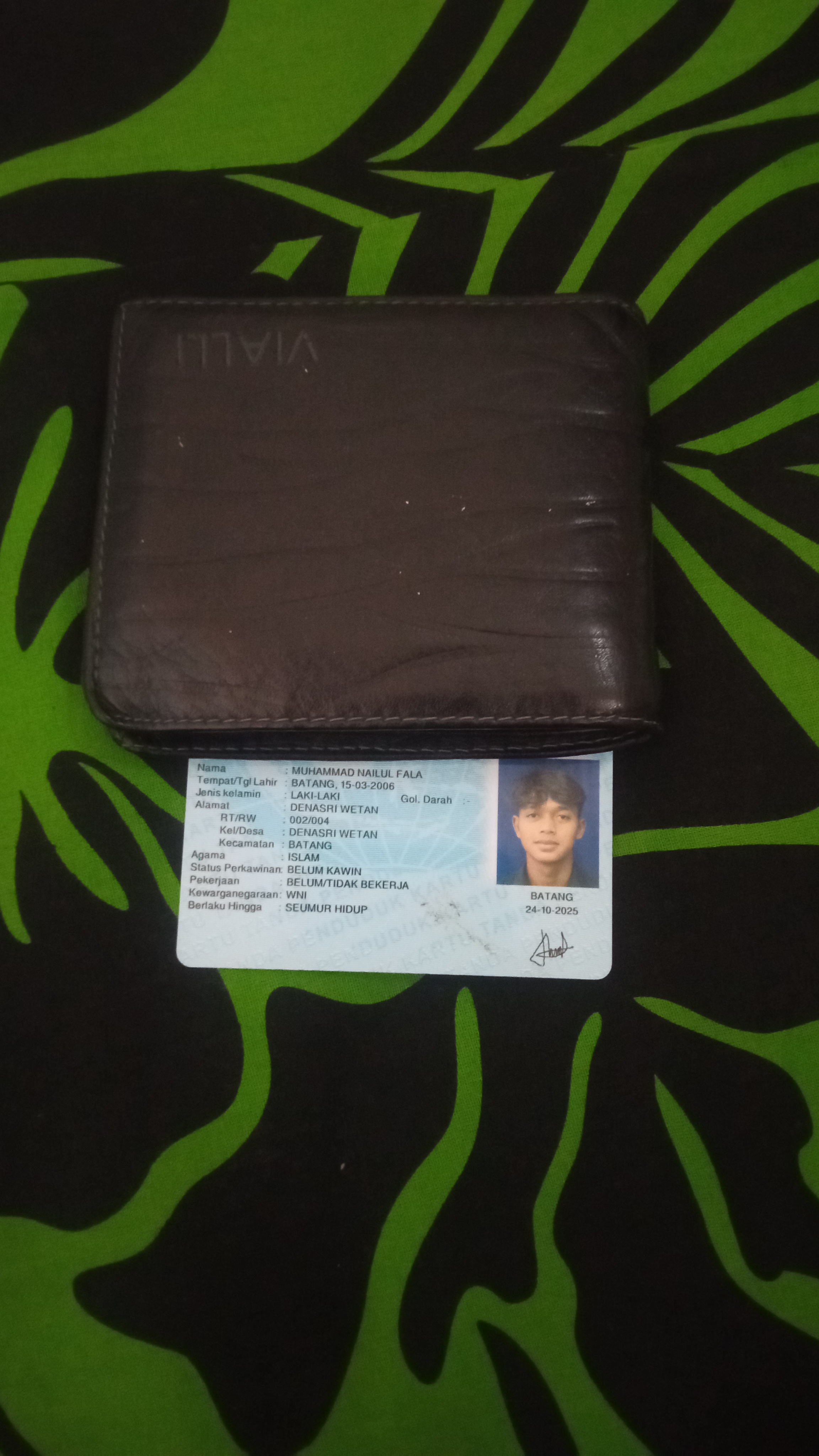 Foto laporan dompet (TB1322)