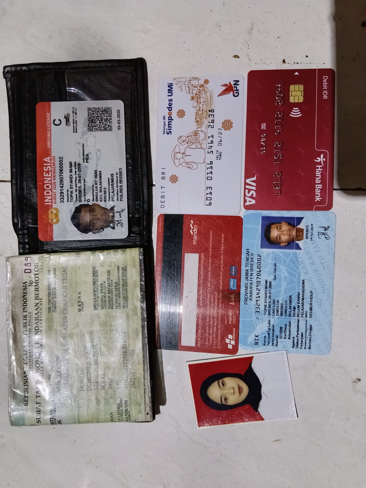 Foto laporan Dompet (TB1335)