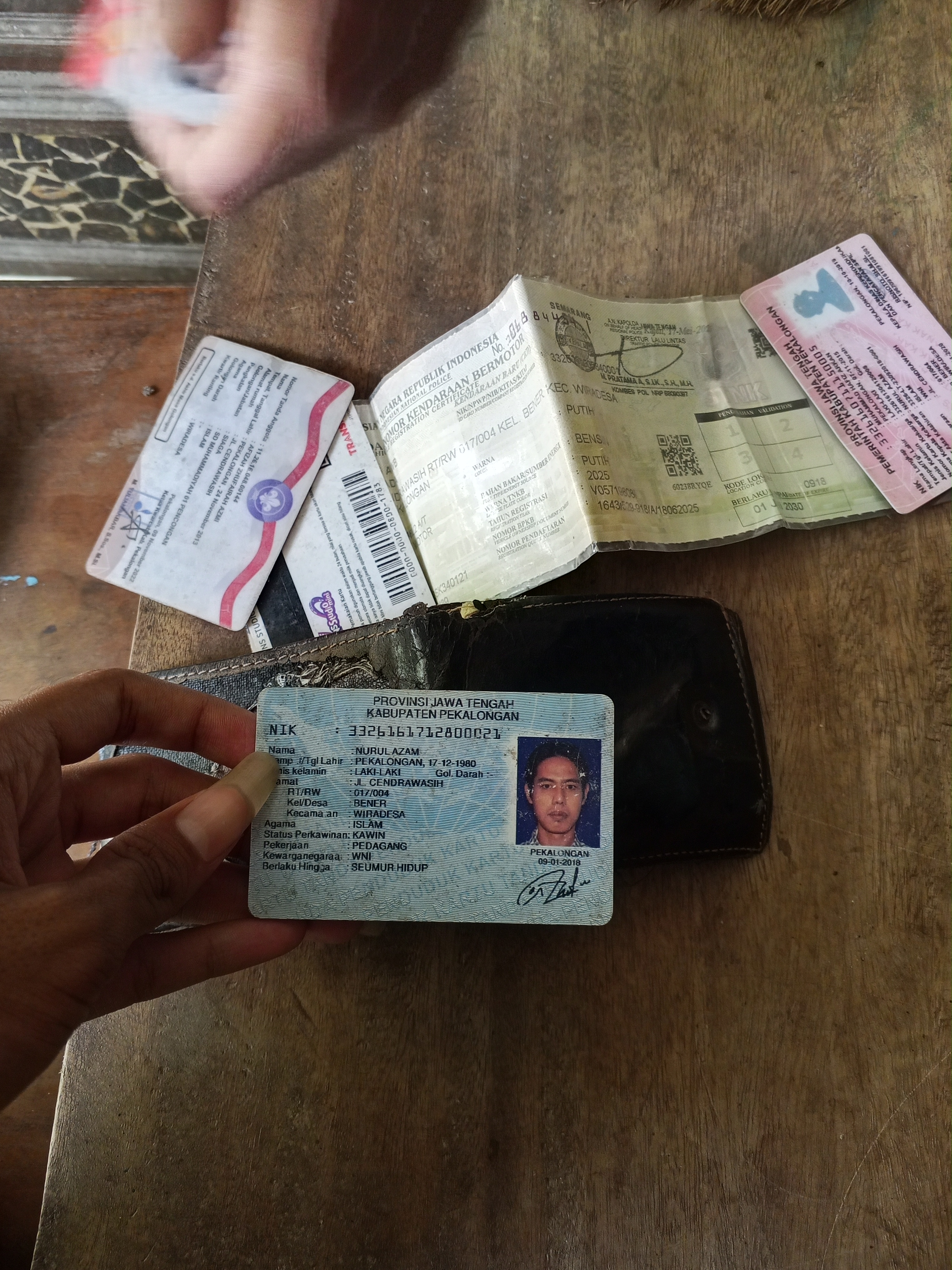 Foto laporan dompet (TB1396)
