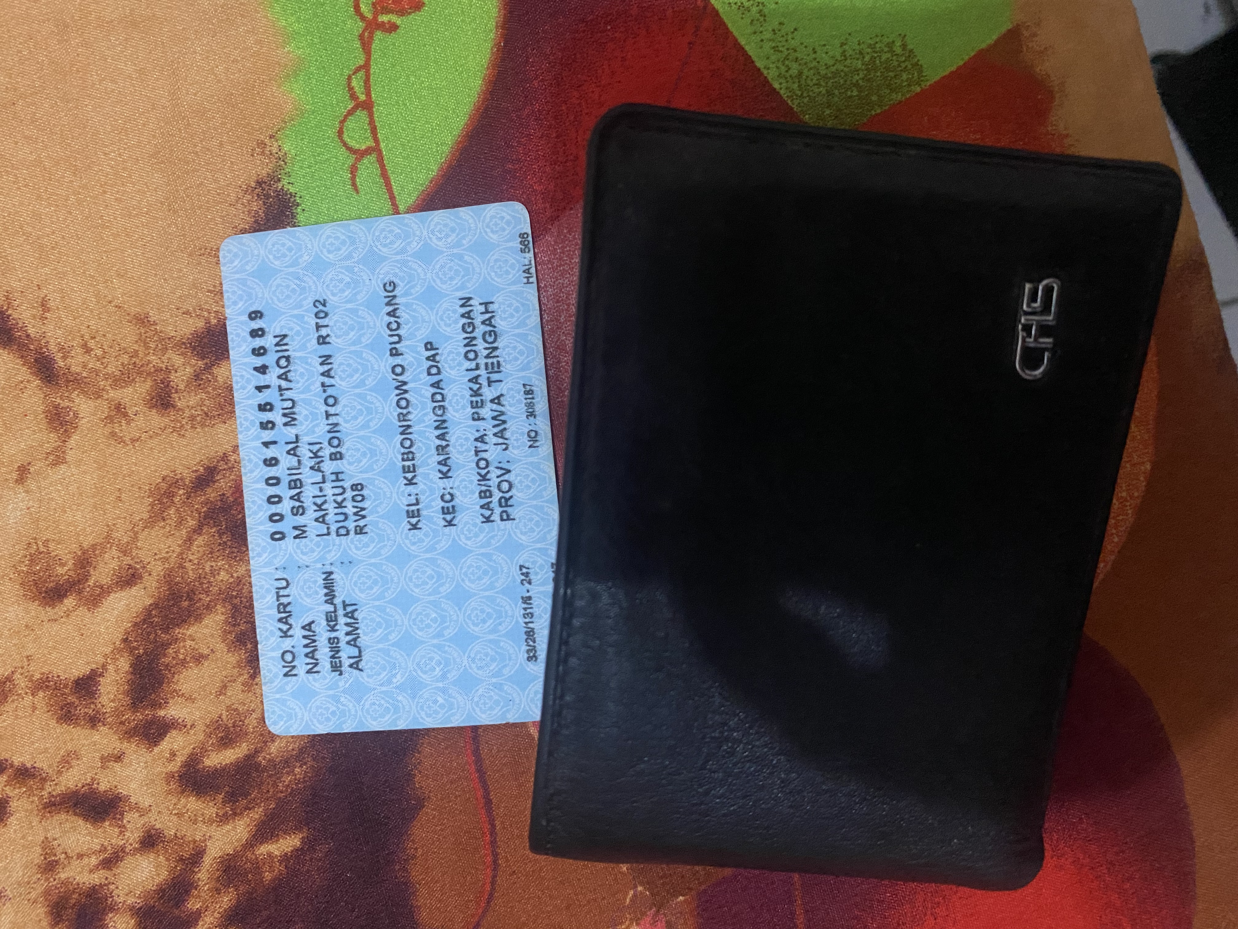 Foto laporan Dompet (TB1405)