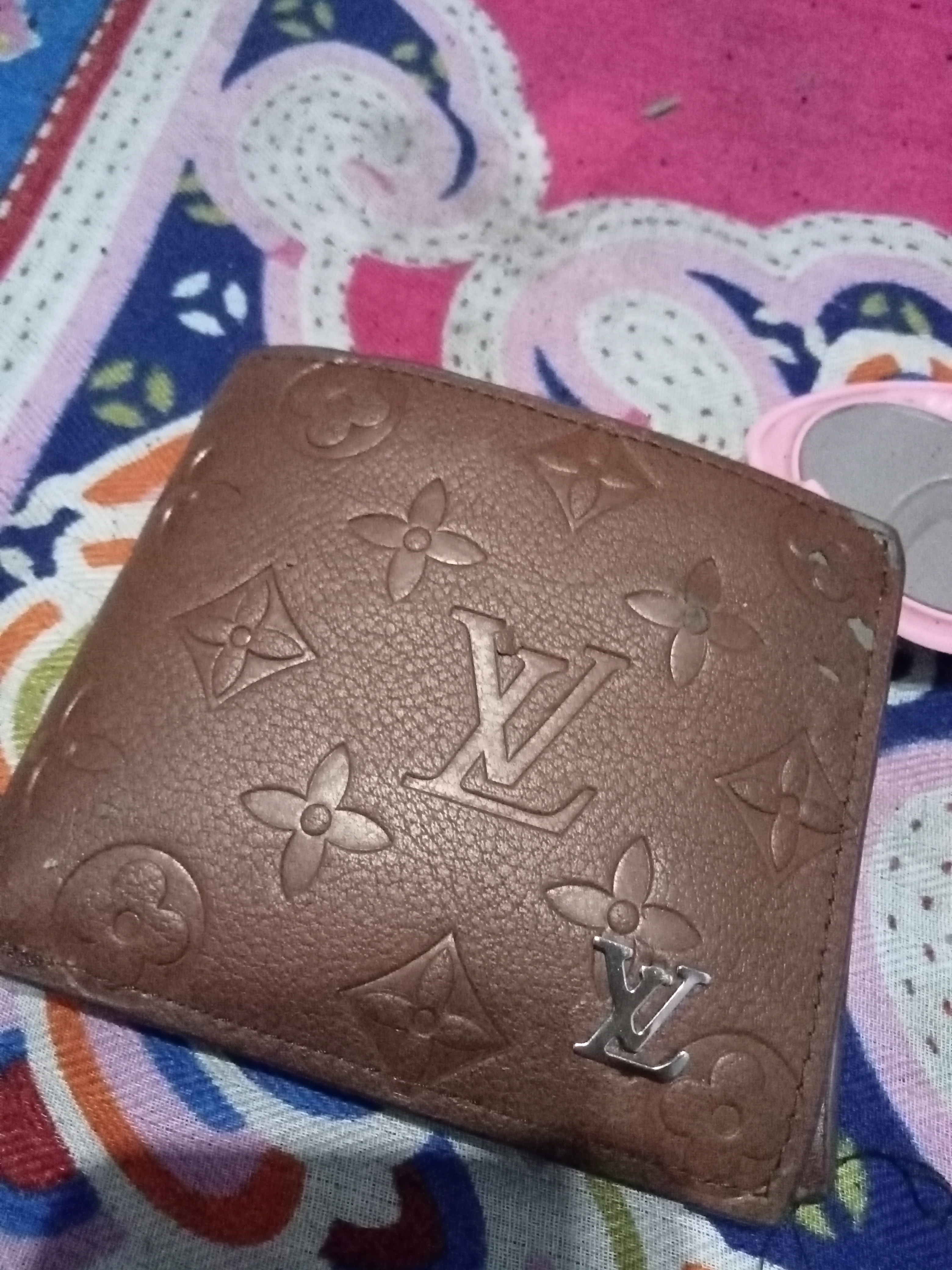 Foto laporan Dompet (TB1412)