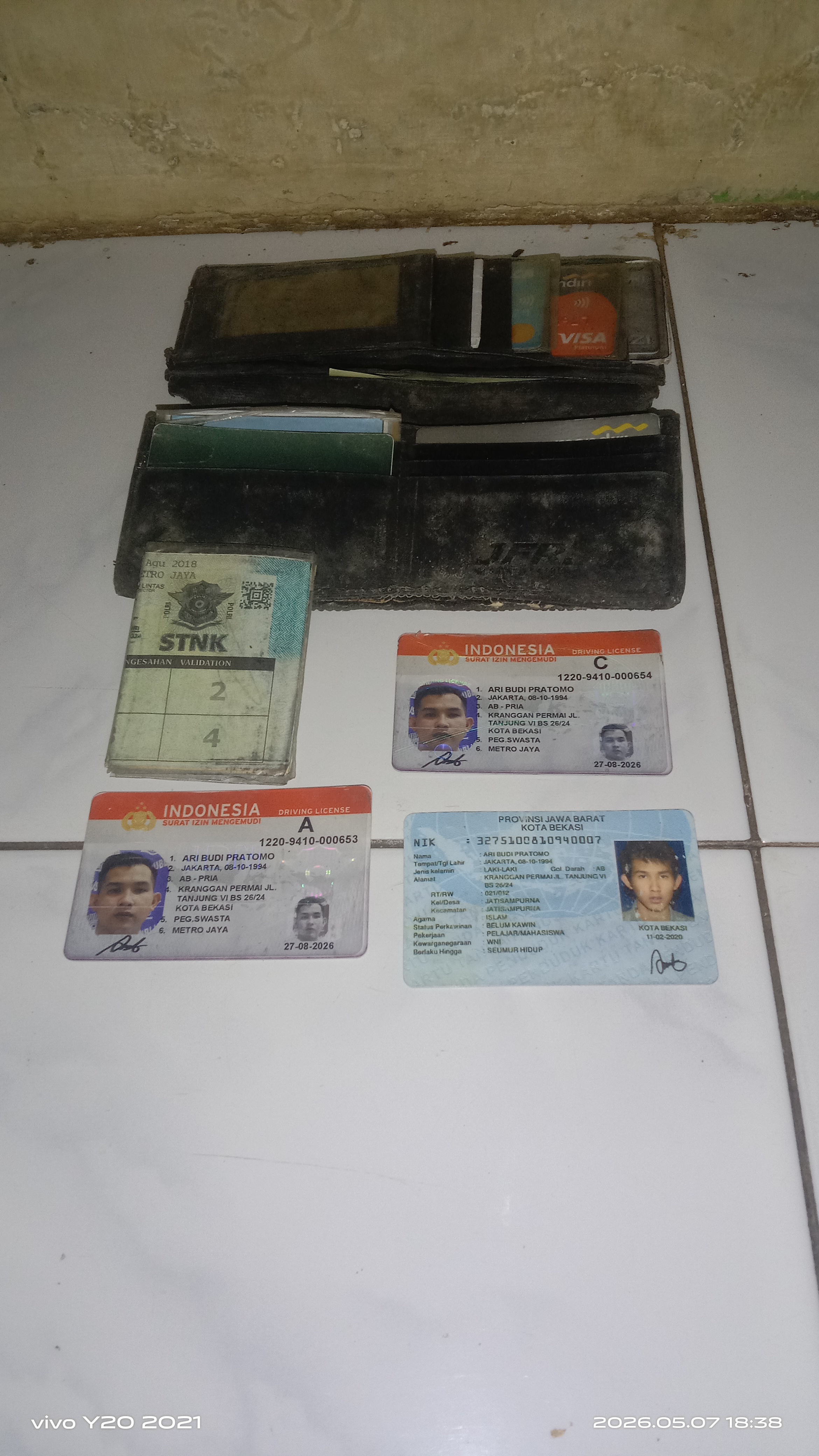 Foto laporan Dompet (TB1434)