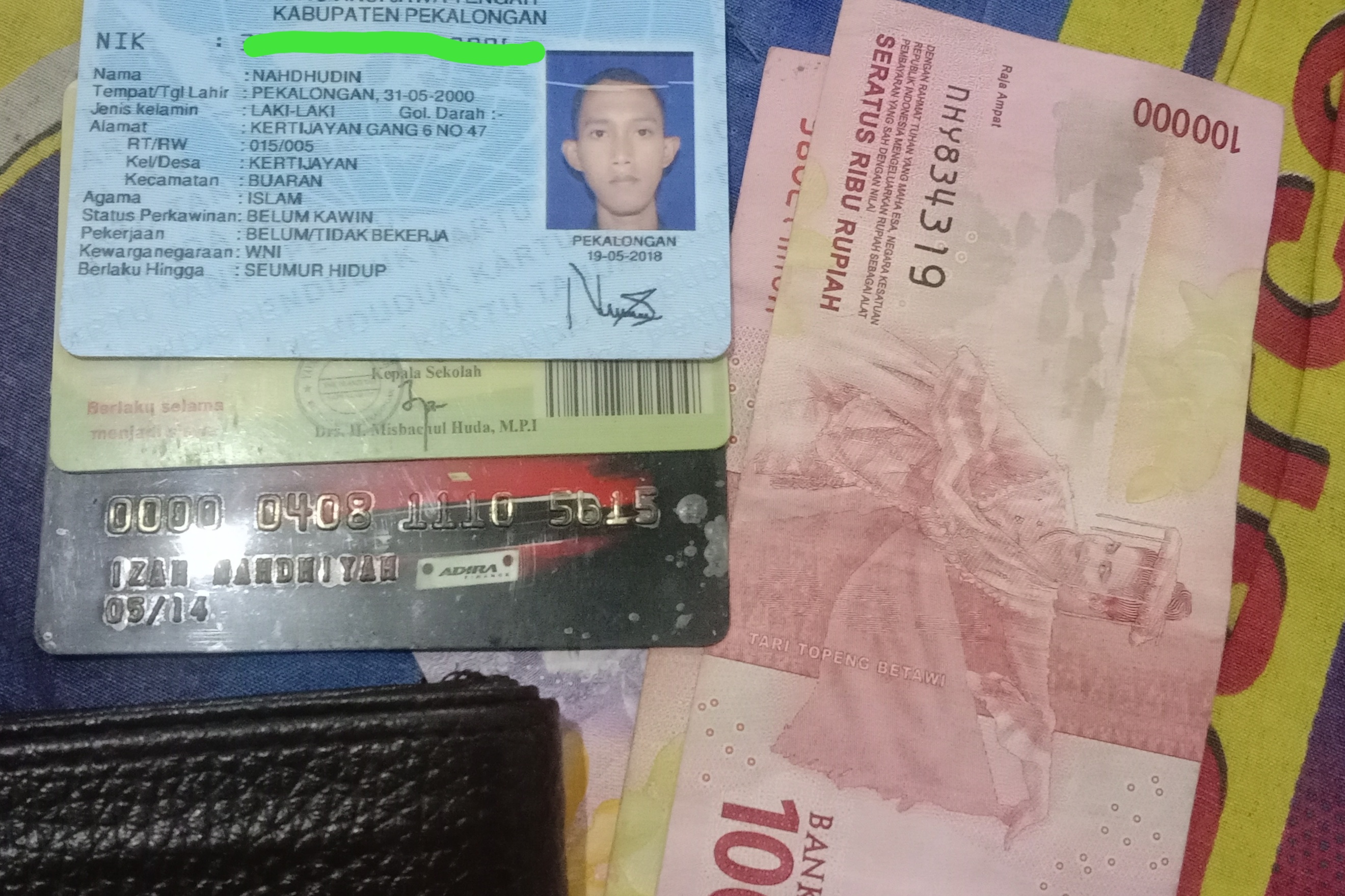 Foto laporan Dompet (TB1451)