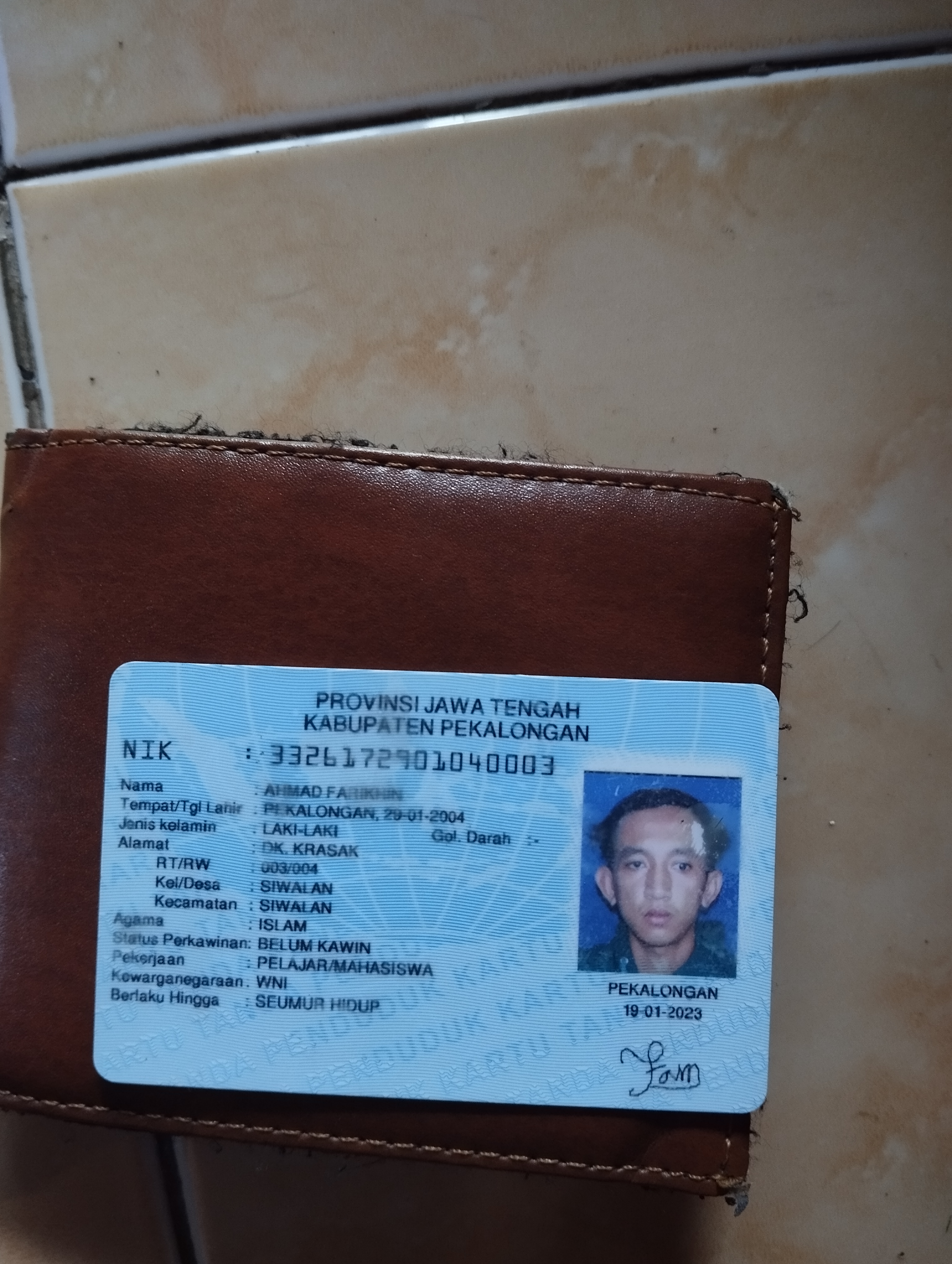 Foto laporan Dompet (TB1475)